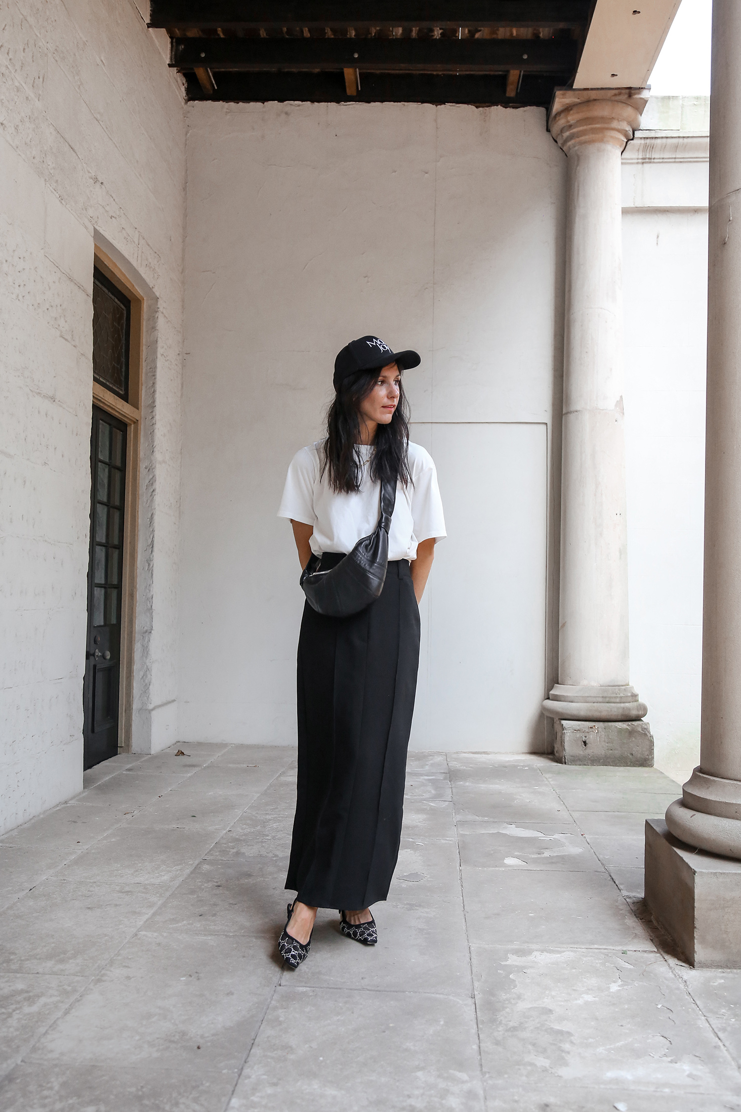 Minimalist styling wearing maxi length trouser skirt with Lemaire croissant bag