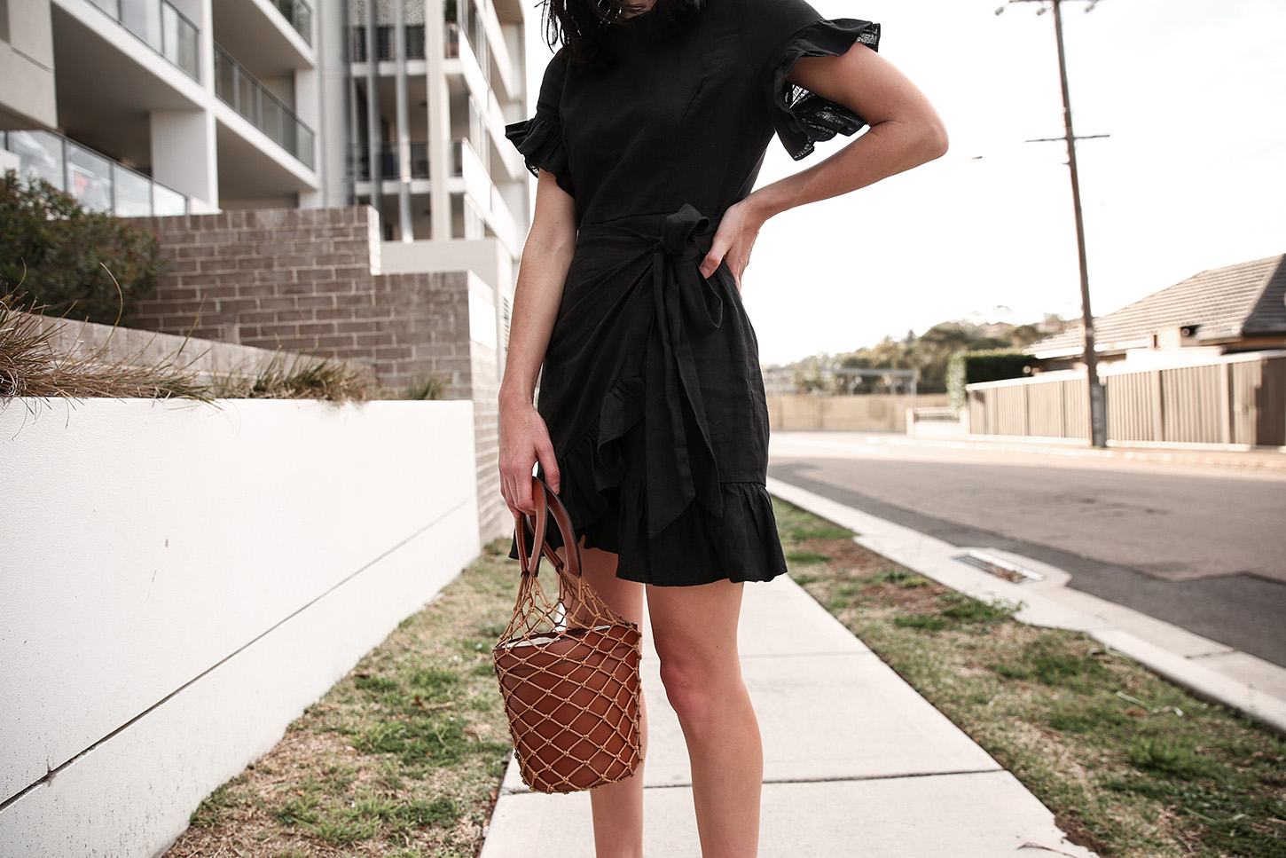 Outfit wearing black ruffle dress
