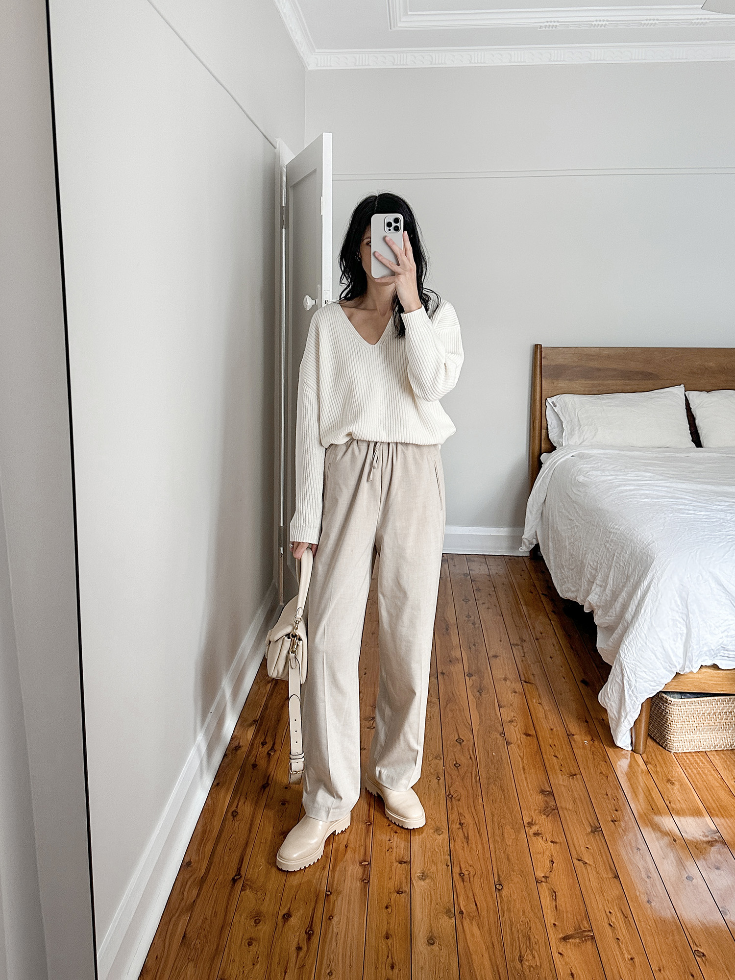 Jenni Kayne cabin sweater with Ouie pants and Coach pillow tabby bag neutral minimal outfit
