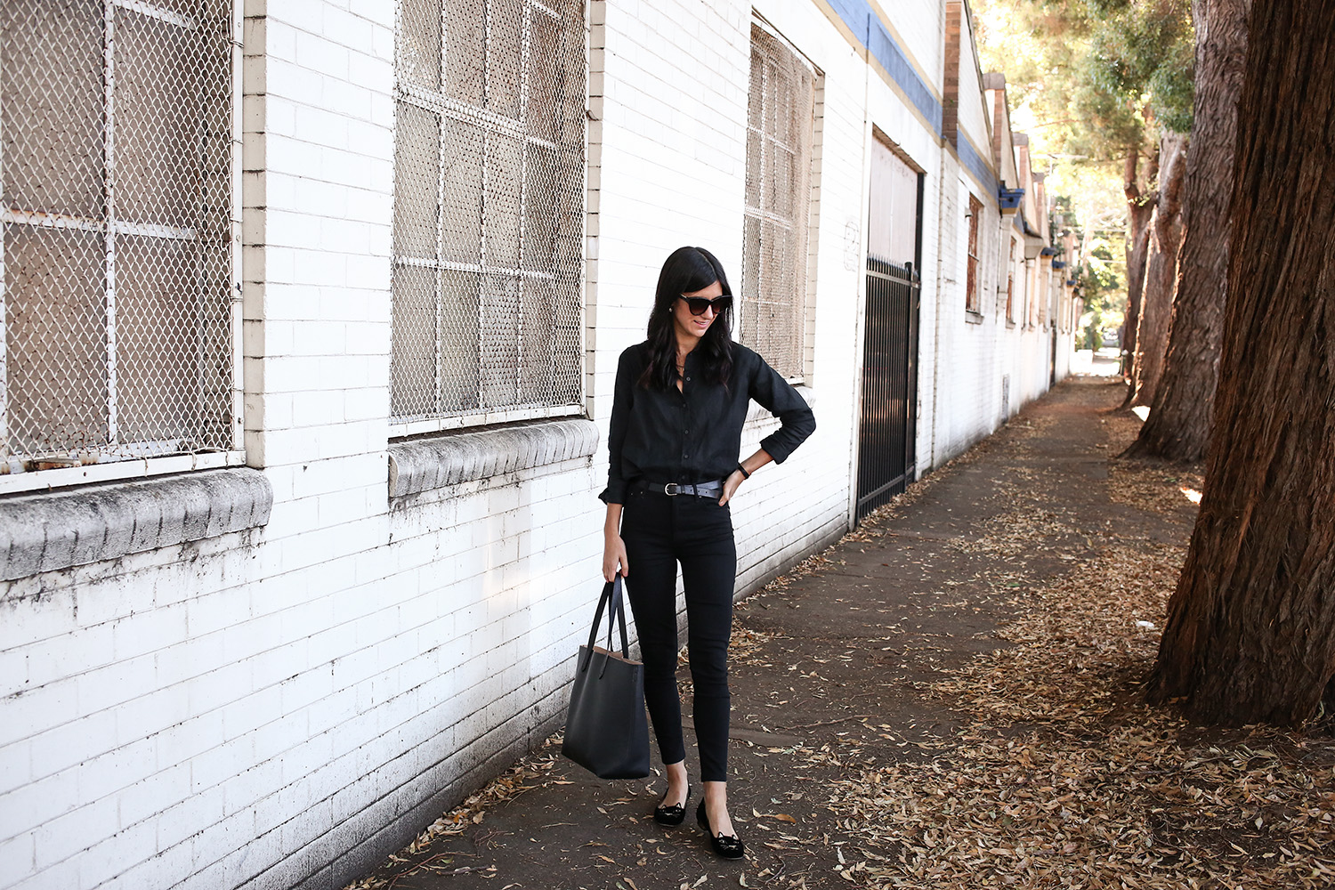 Jamie Lee of Mademoiselle wearing an all black minimal style outfit