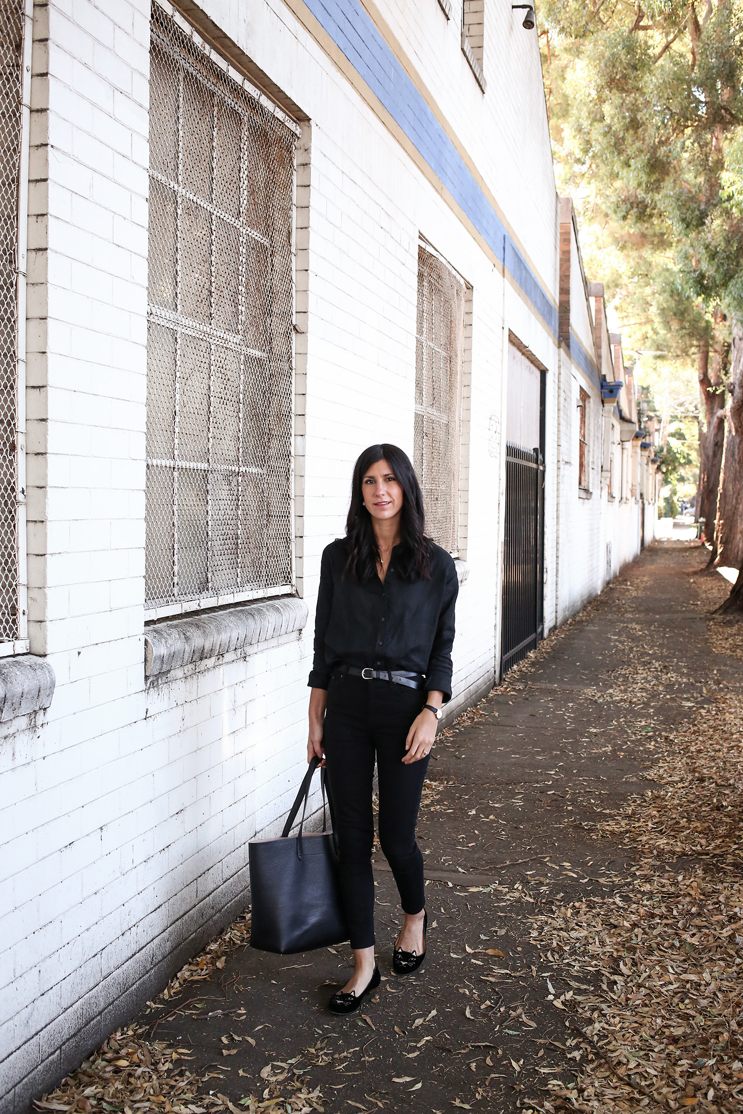 Jamie Lee of Mademoiselle wearing an all black minimal style outfit