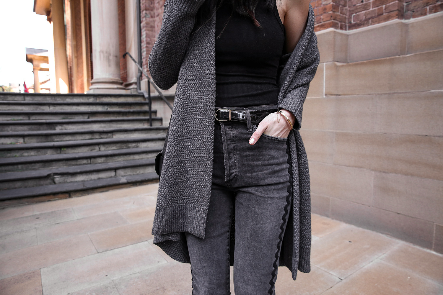 Jamie Lee of Mademoiselle wearing a black mock croc leather belt and Citizens of Humanity jeans