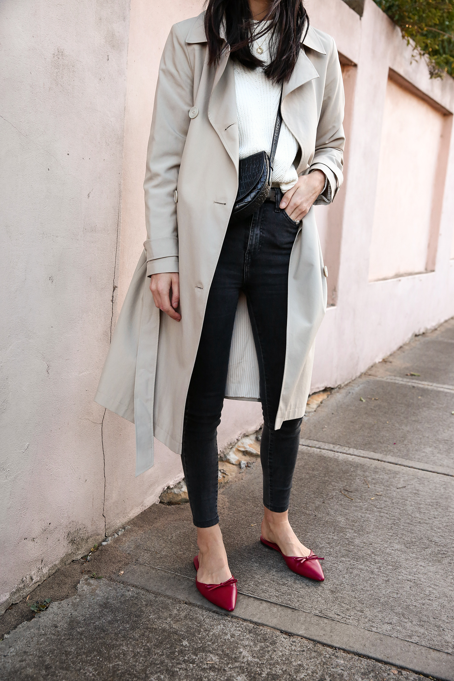 Jamie Lee of Mademoiselle wearing a minimal outfit with red shoes