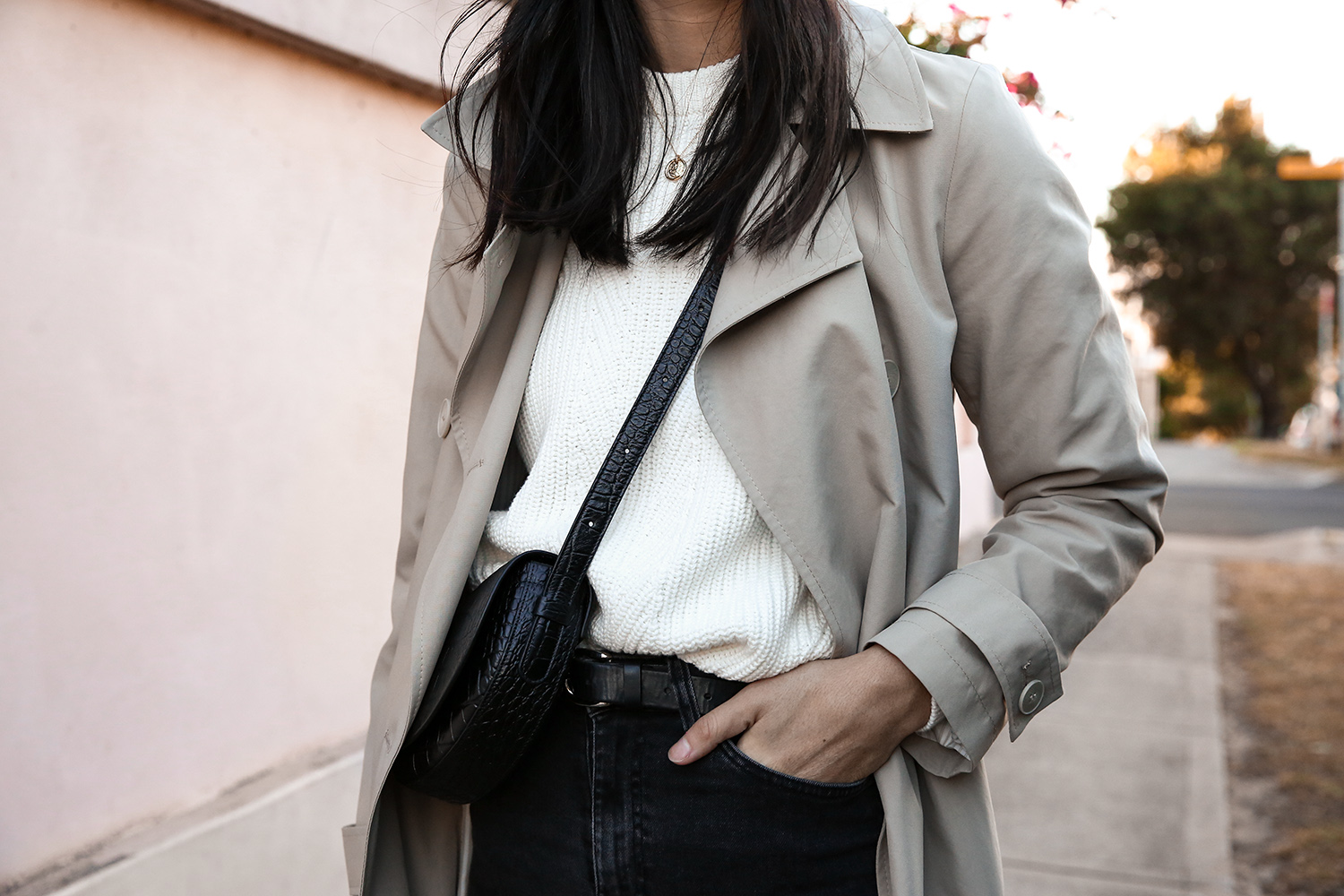 Jamie Lee of Mademoiselle wearing a minimal outfit with red shoes