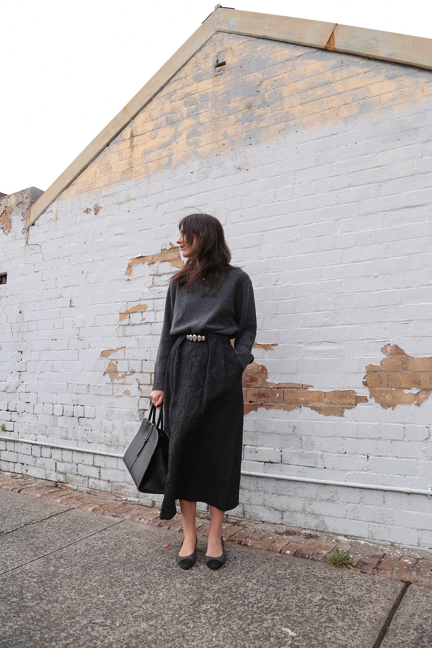 Monochromatic outfit wearing Quince cashmere sweater and Foemina Jean Skirt