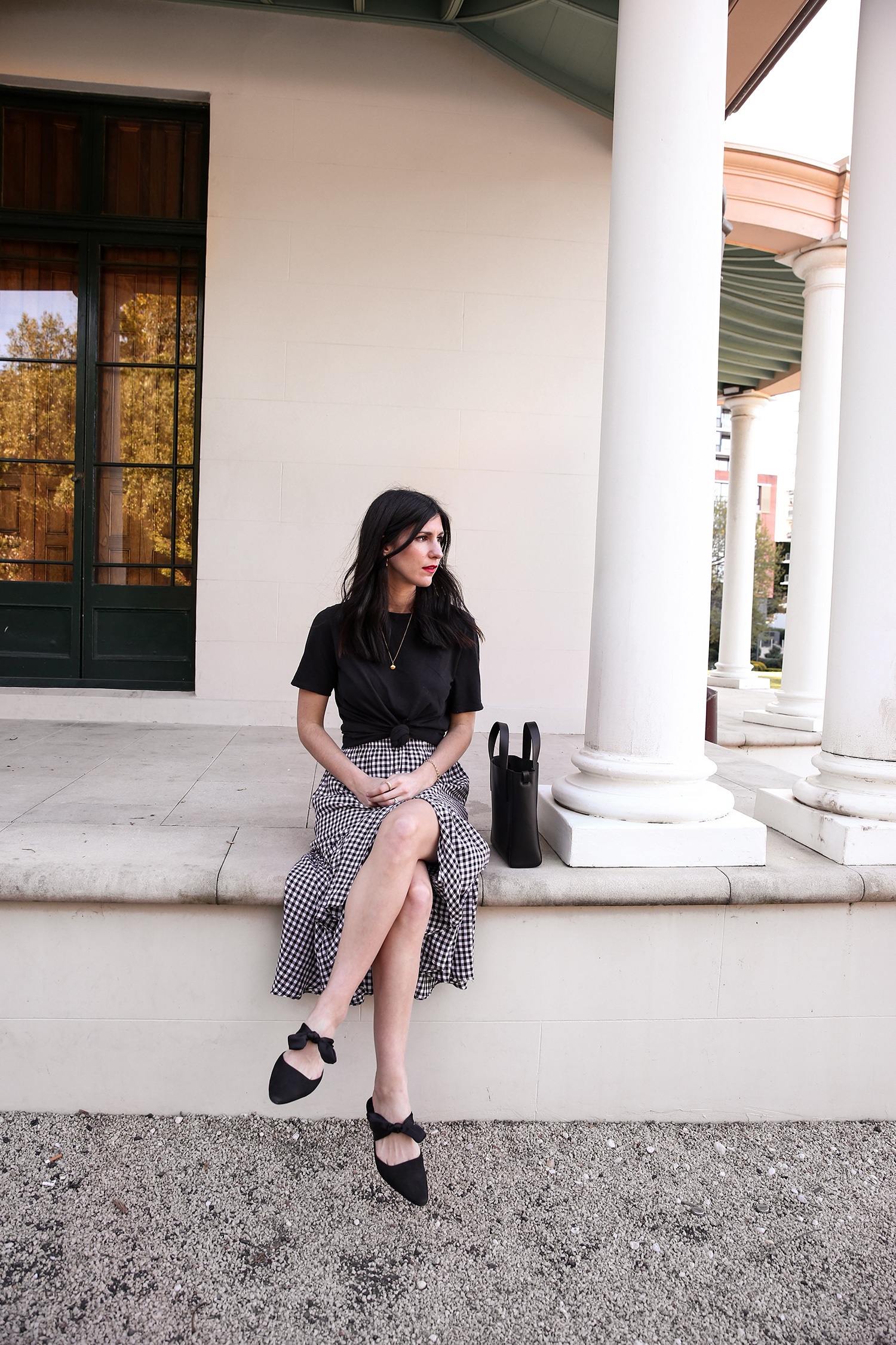 Jamie Lee of Mademoiselle wearing a knotted tee and gingham skirt minimal style