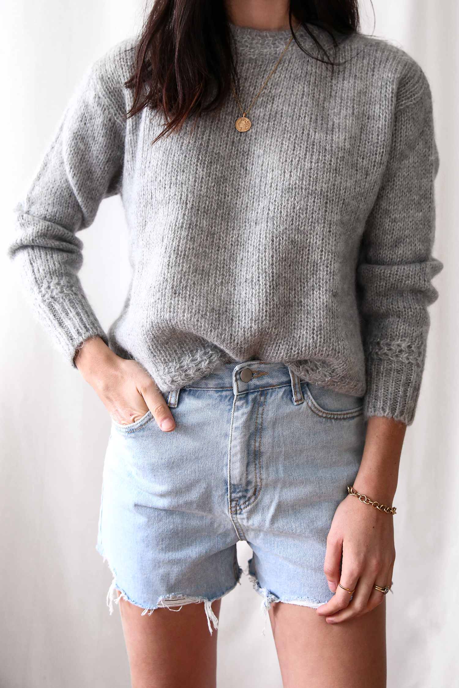 Jamie Lee of Mademoiselle wearing the Sezane Chuck Jumper in Grey Marl