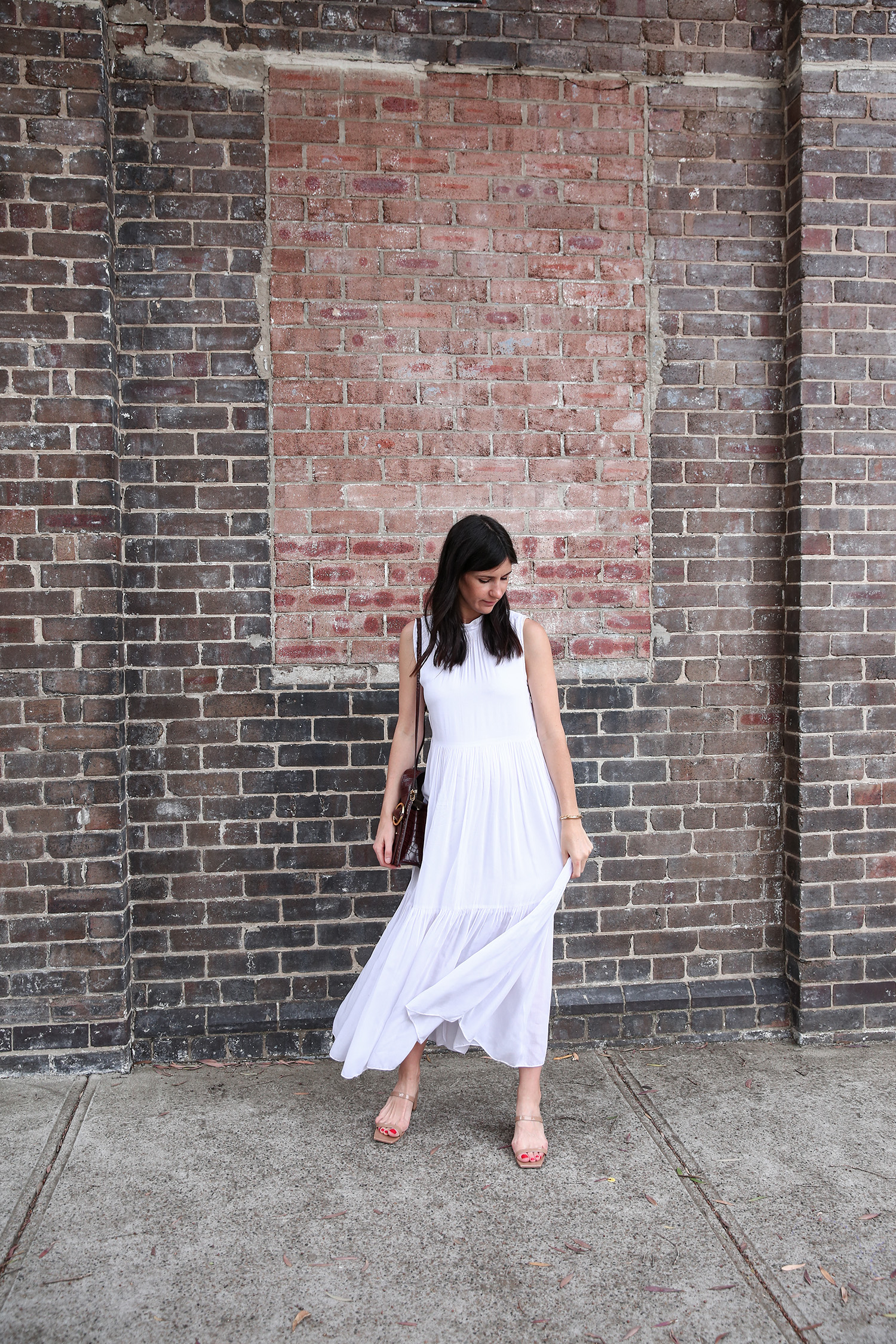 Jamie Lee of Mademoiselle wearing the Lune Resort Noni Maxi Dress and By Far Mules