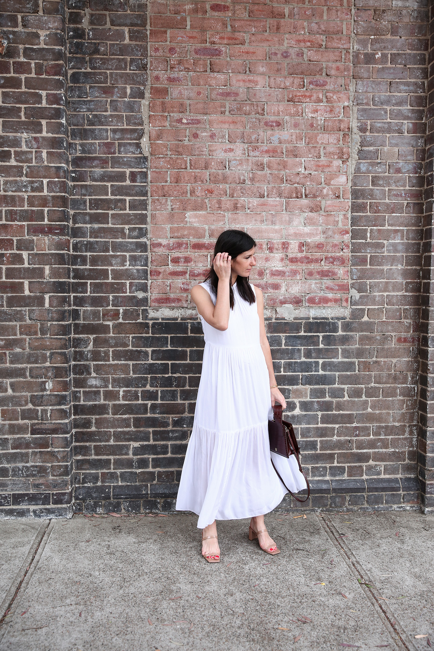 Jamie Lee of Mademoiselle wearing the Lune Resort Noni Maxi Dress and By Far Mules