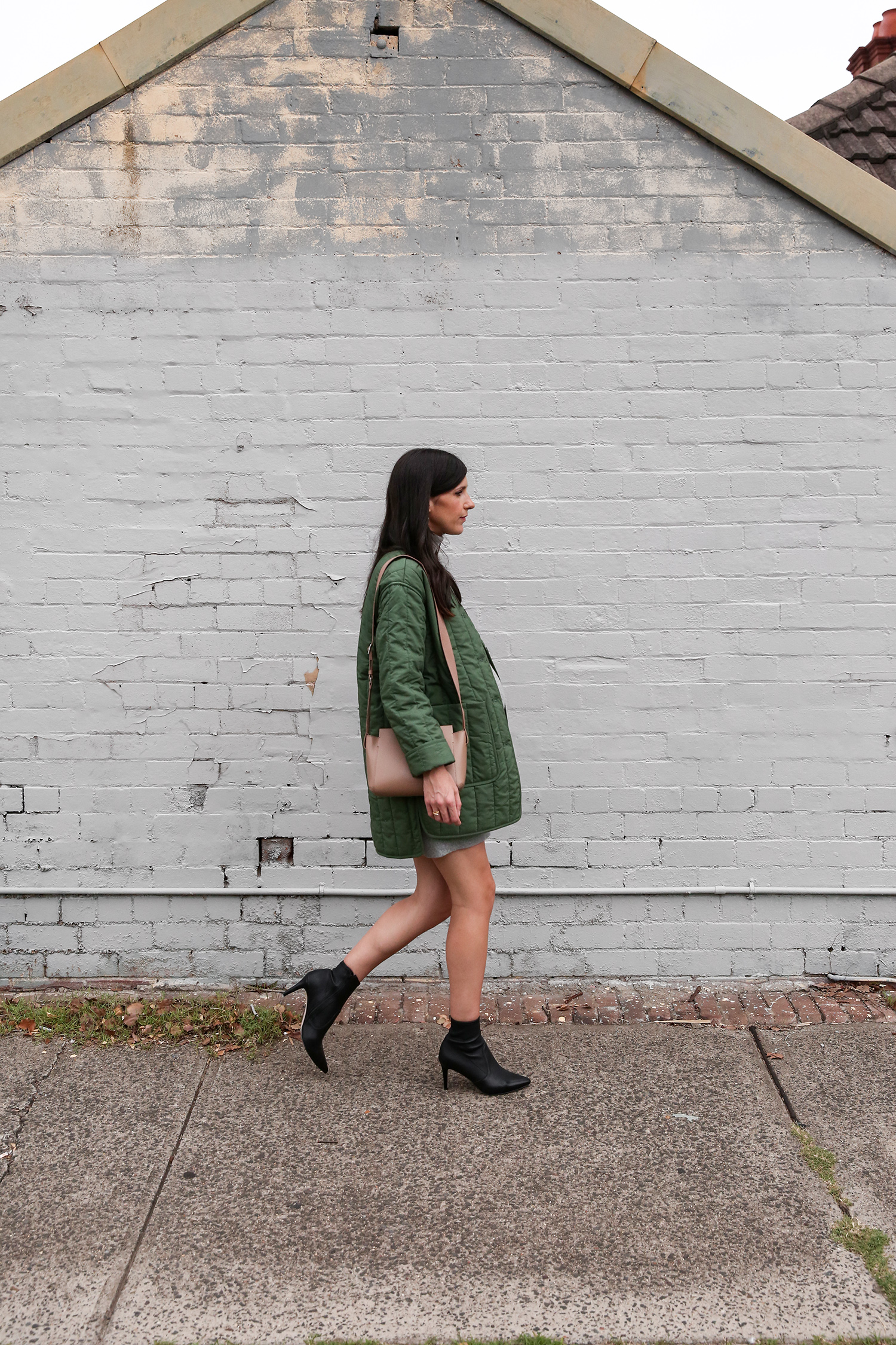 Jamie Lee of Mademoiselle wearing an Everlane cashmere mini dress and cotton quilted jacket