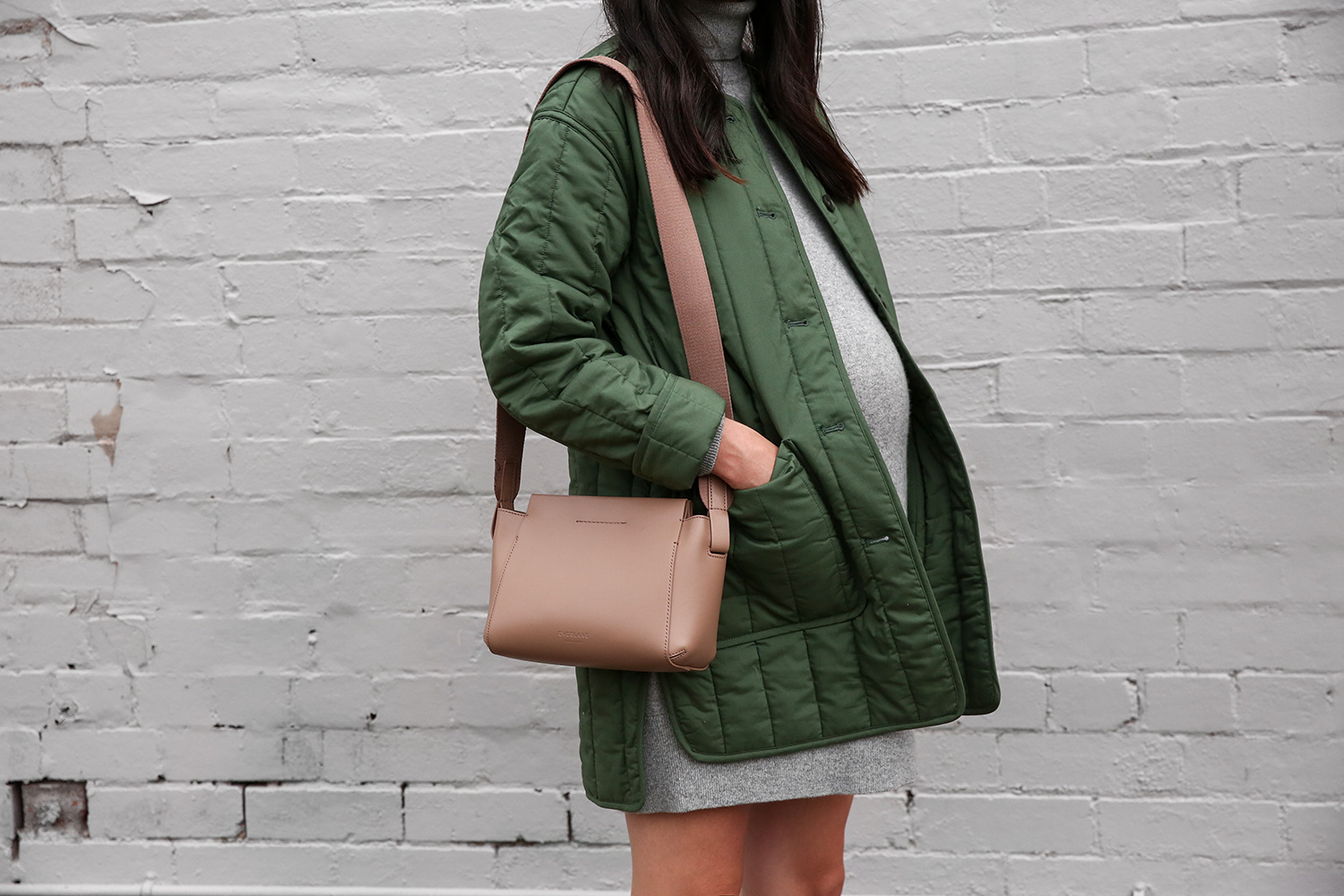 Jamie Lee of Mademoiselle wearing an Everlane cashmere mini dress and cotton quilted jacket