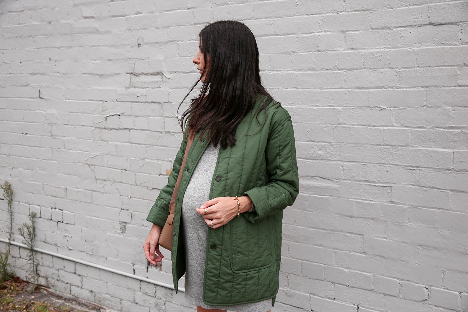 Jamie Lee of Mademoiselle wearing an Everlane cashmere mini dress and cotton quilted jacket