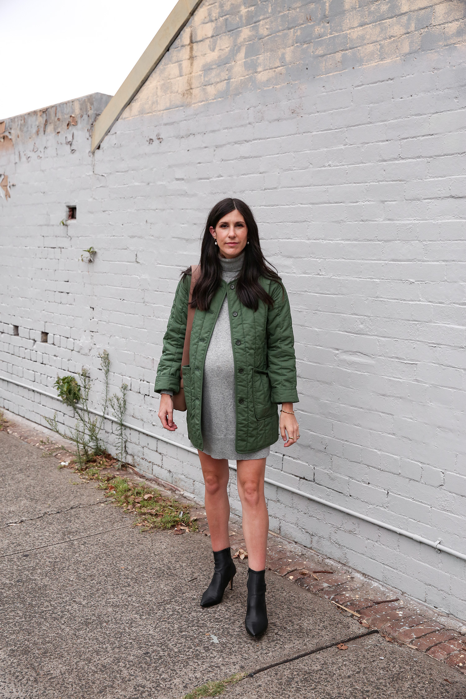 Jamie Lee of Mademoiselle wearing an Everlane cashmere mini dress and cotton quilted jacket