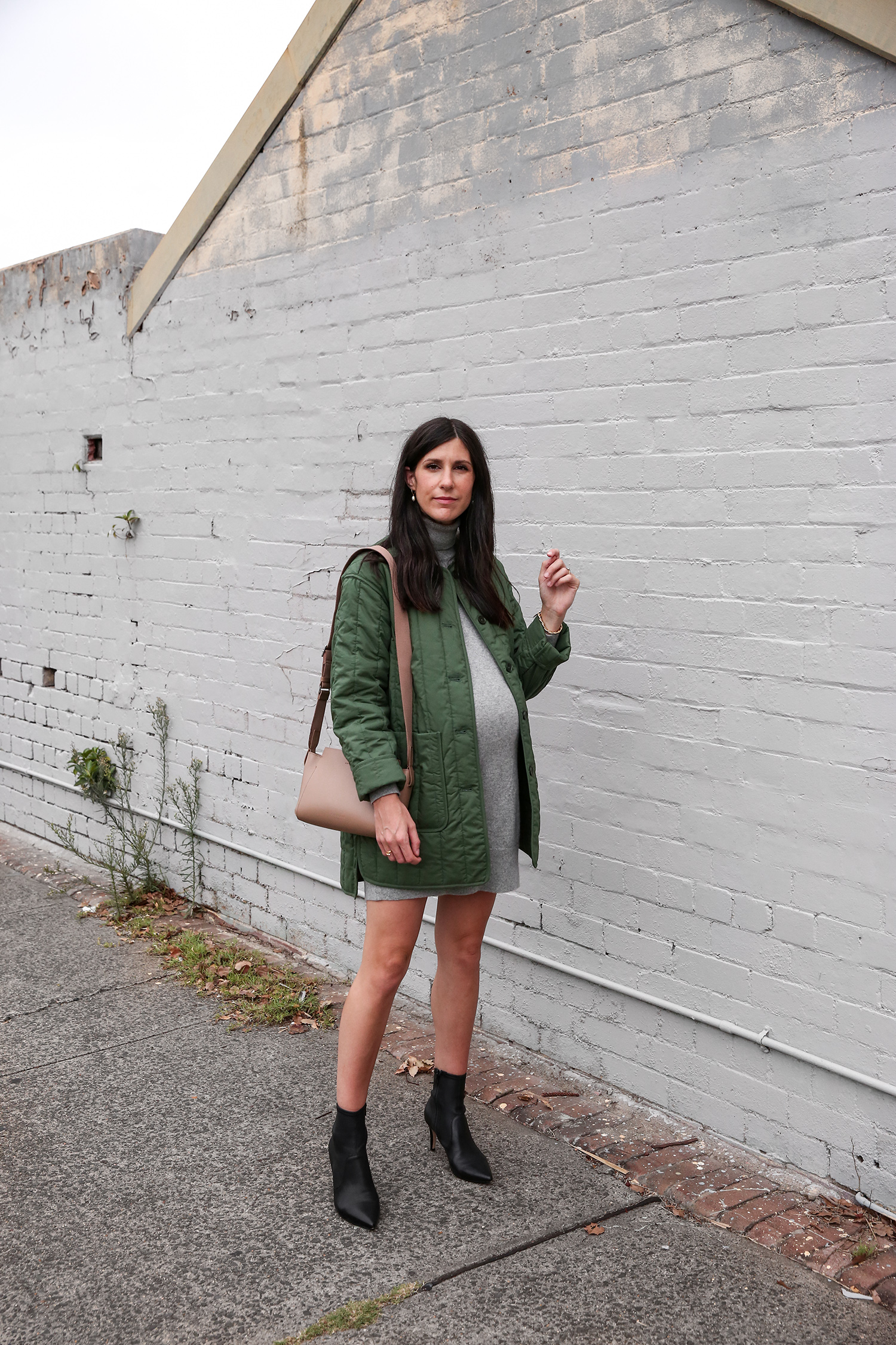 Jamie Lee of Mademoiselle wearing an Everlane cashmere mini dress and cotton quilted jacket