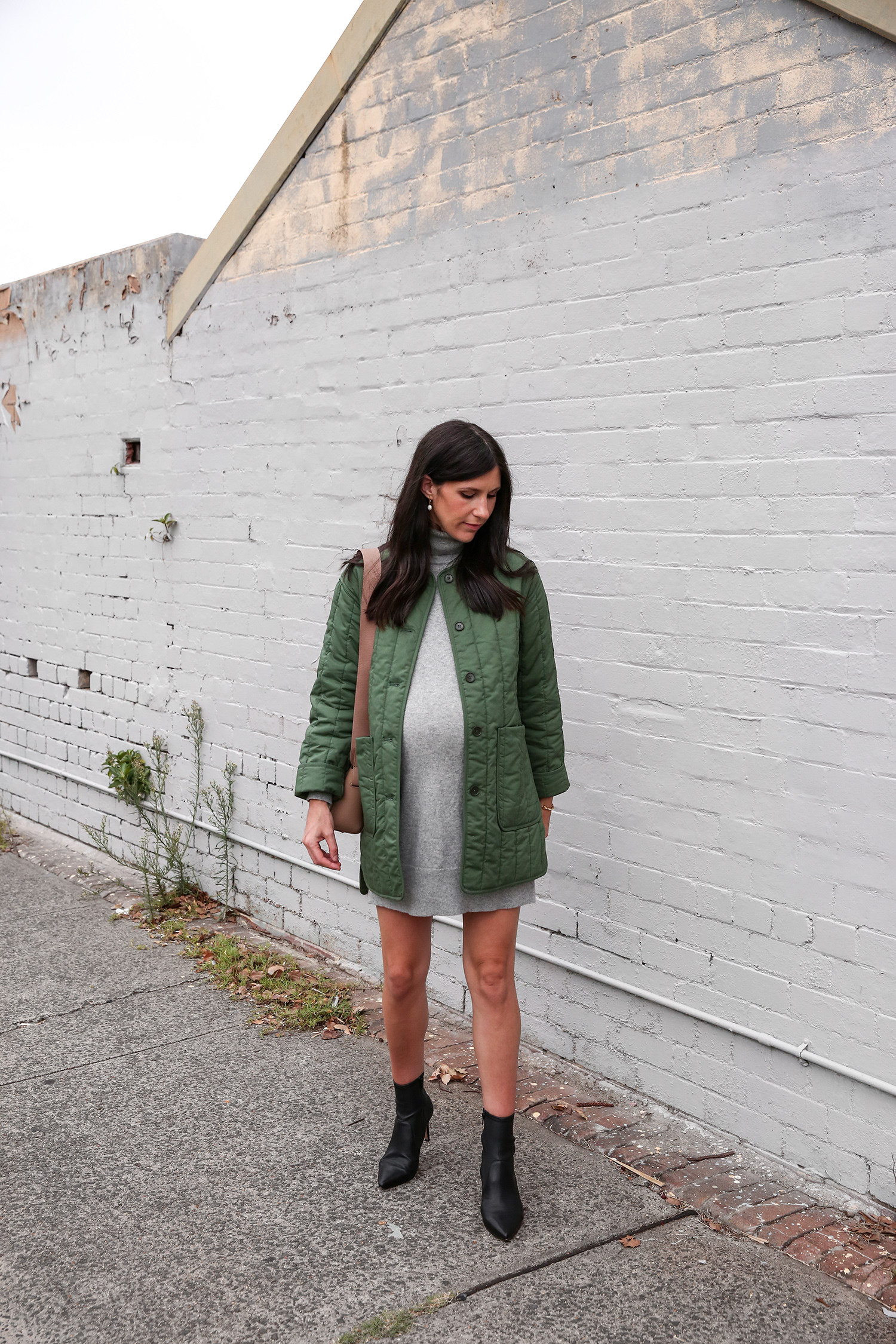 Jamie Lee of Mademoiselle wearing an Everlane cashmere mini dress and cotton quilted jacket