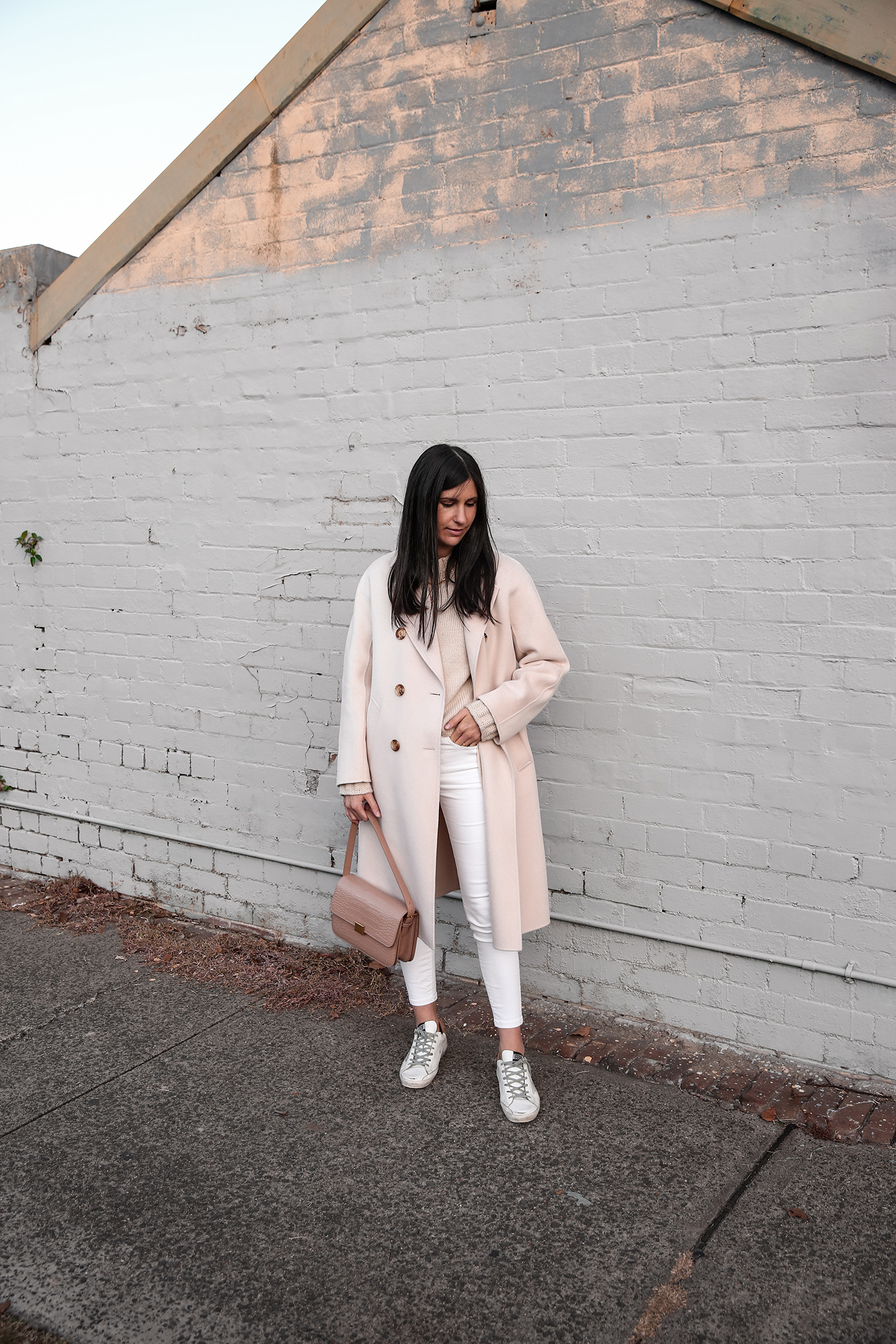 Jamie Lee of Mademoiselle wearing The Curated coat with neutral tones - scandi style