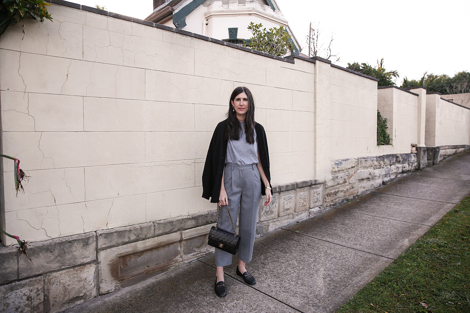 Jamie Lee of Mademoiselle wearing And Other Stories black cardigan and Acne Studios trea trousers