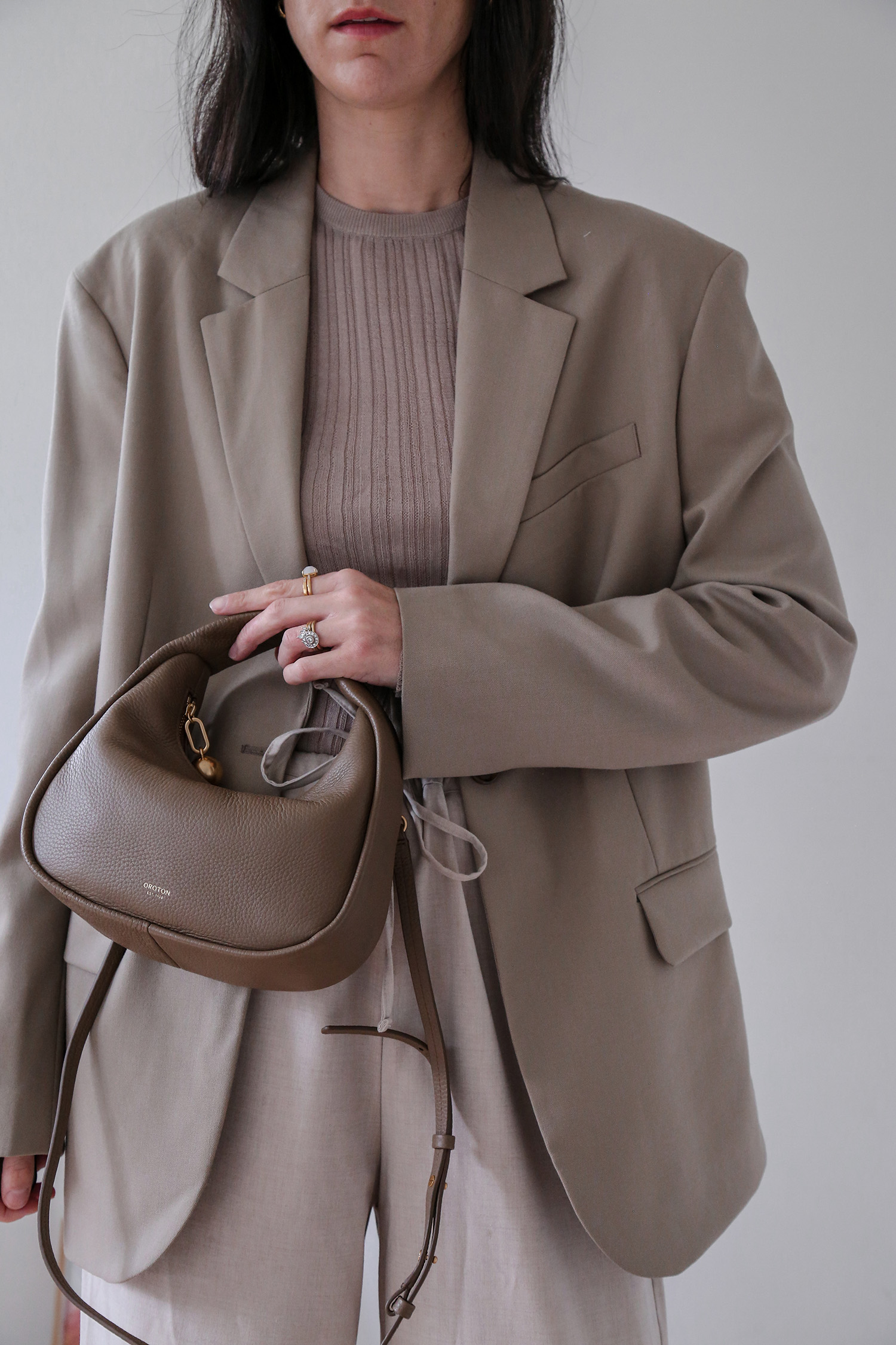Arket wool hopsack blazer with DISSH harper long sleeve top and fluid drape trousers with Oroton Clara bag