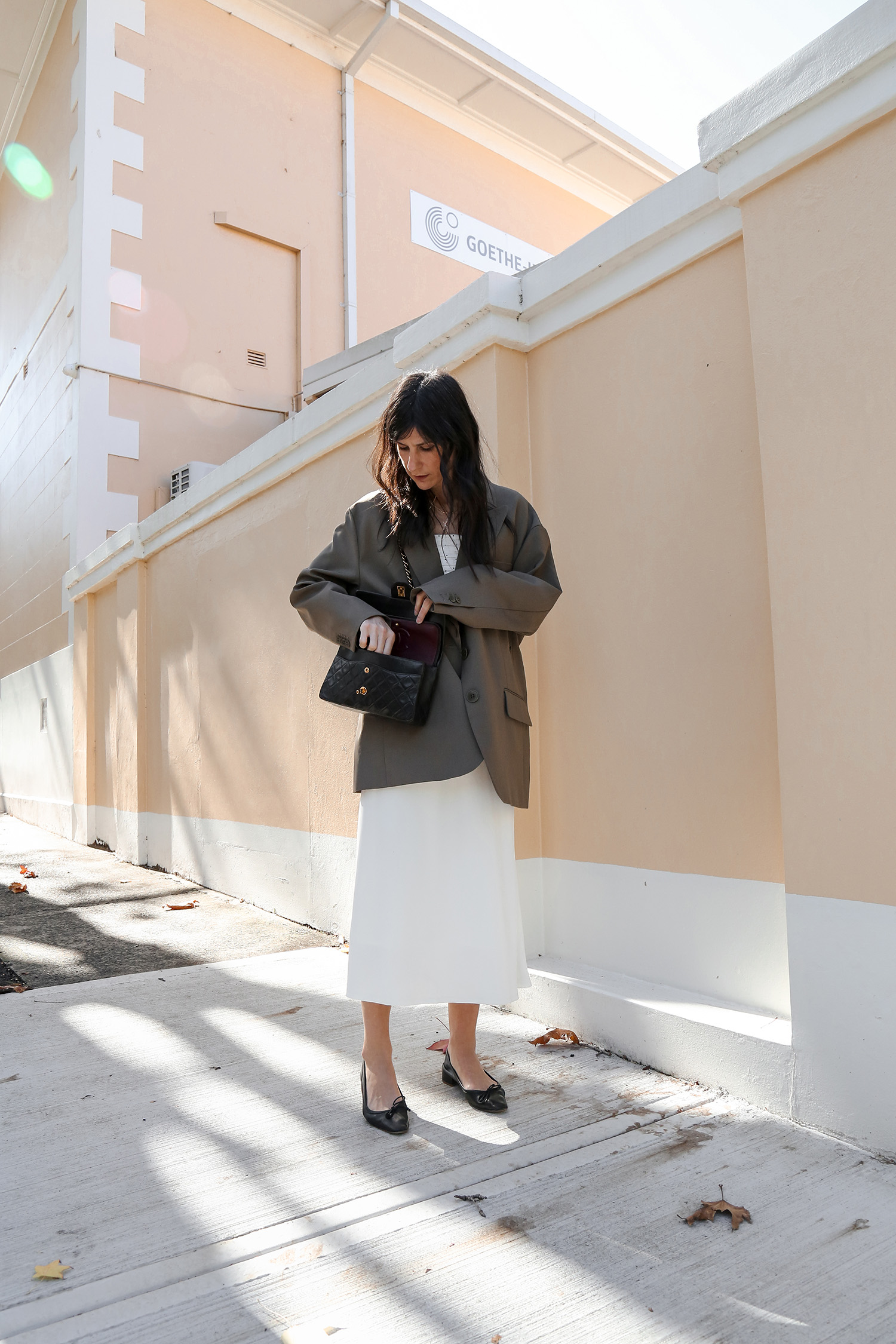 All white outfit with taupe oversized blazer minimal chic style