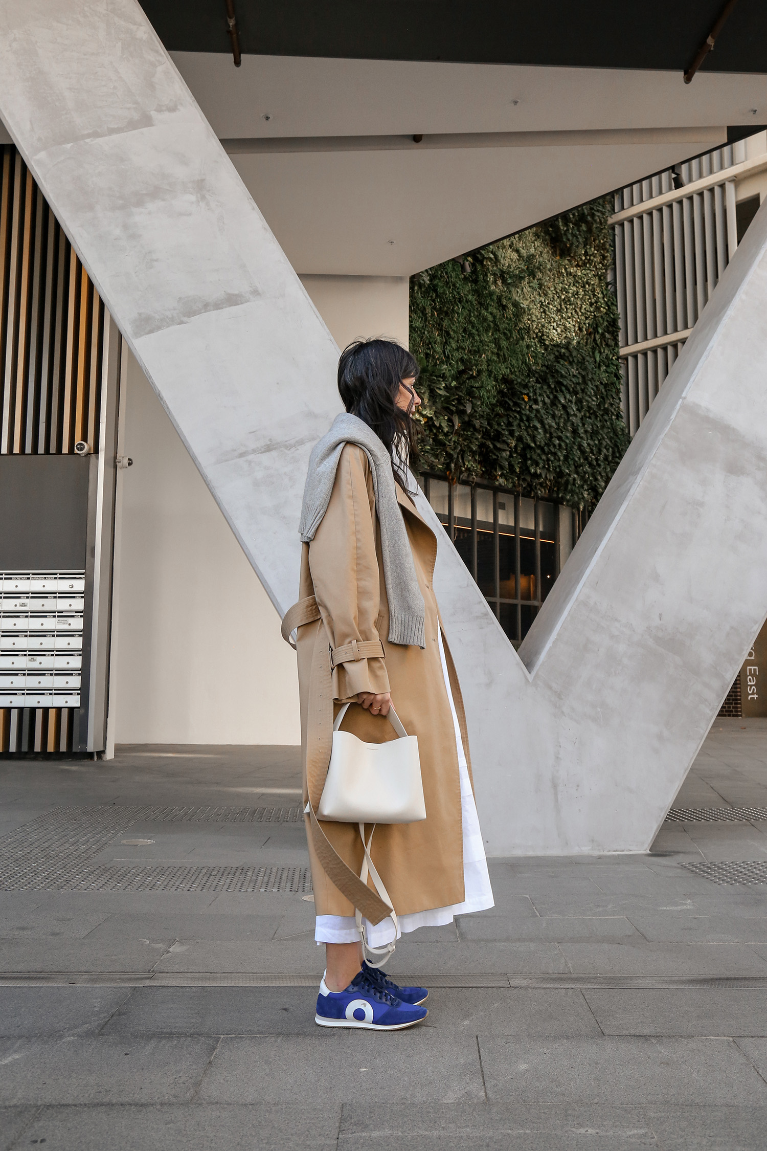 Minimal scandi chic trench coat side profile