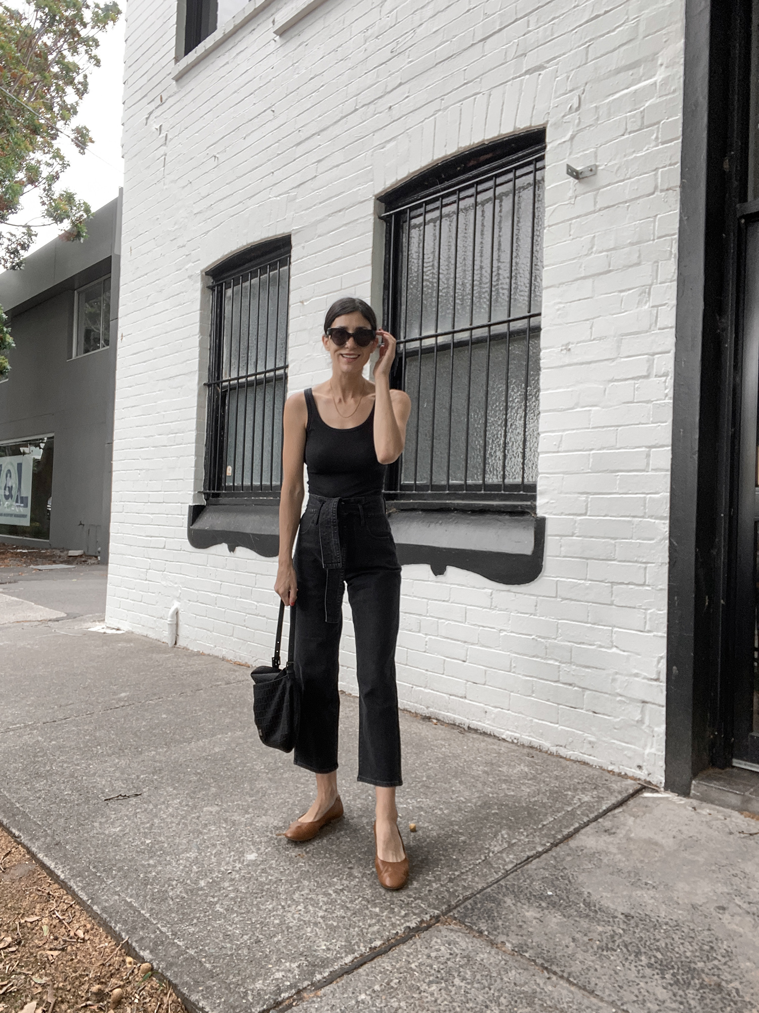 Wearing all black & wide leg jeans - Mademoiselle