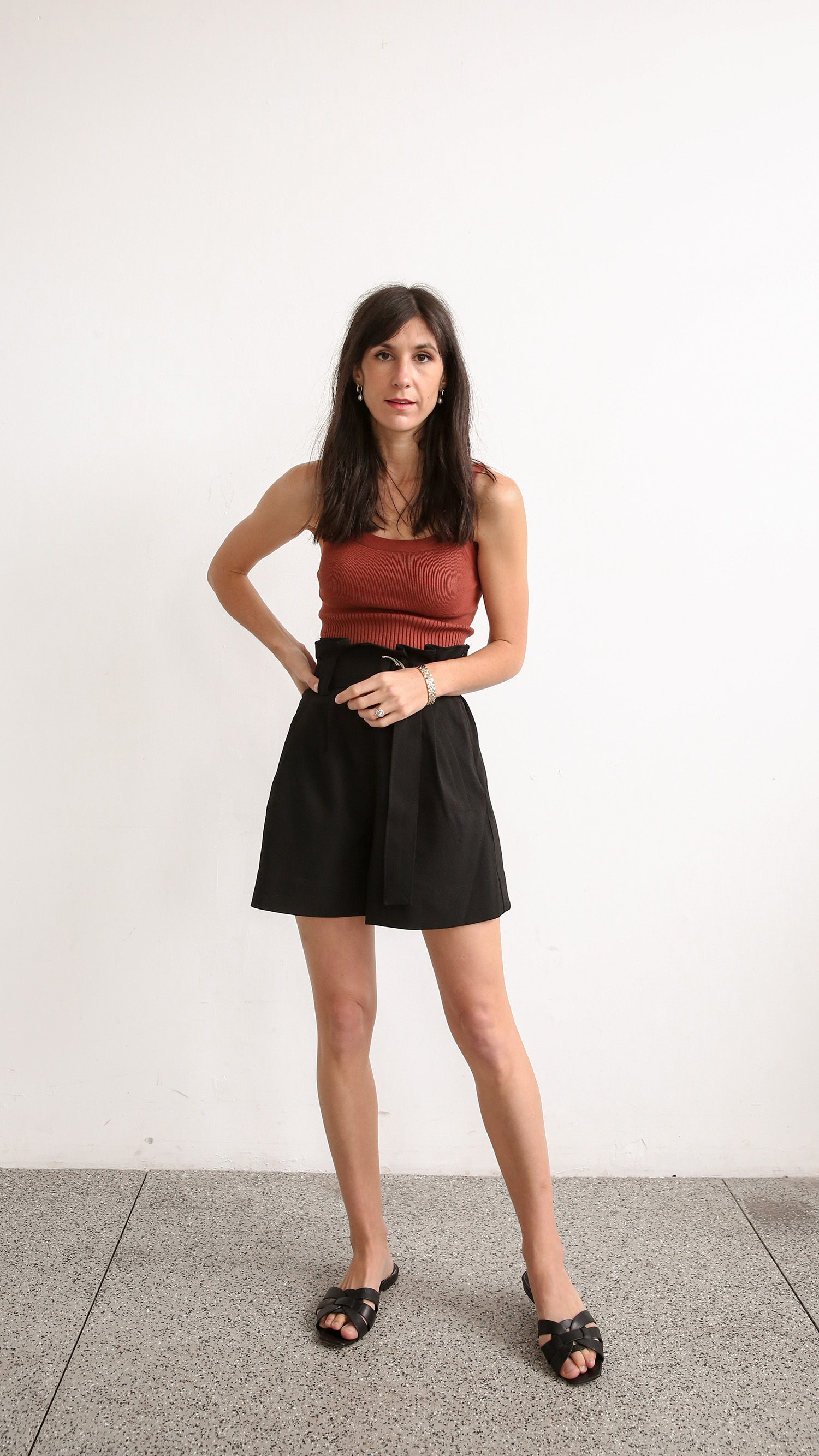 Everlane cropped sweater cami and Ganni black belted shorts