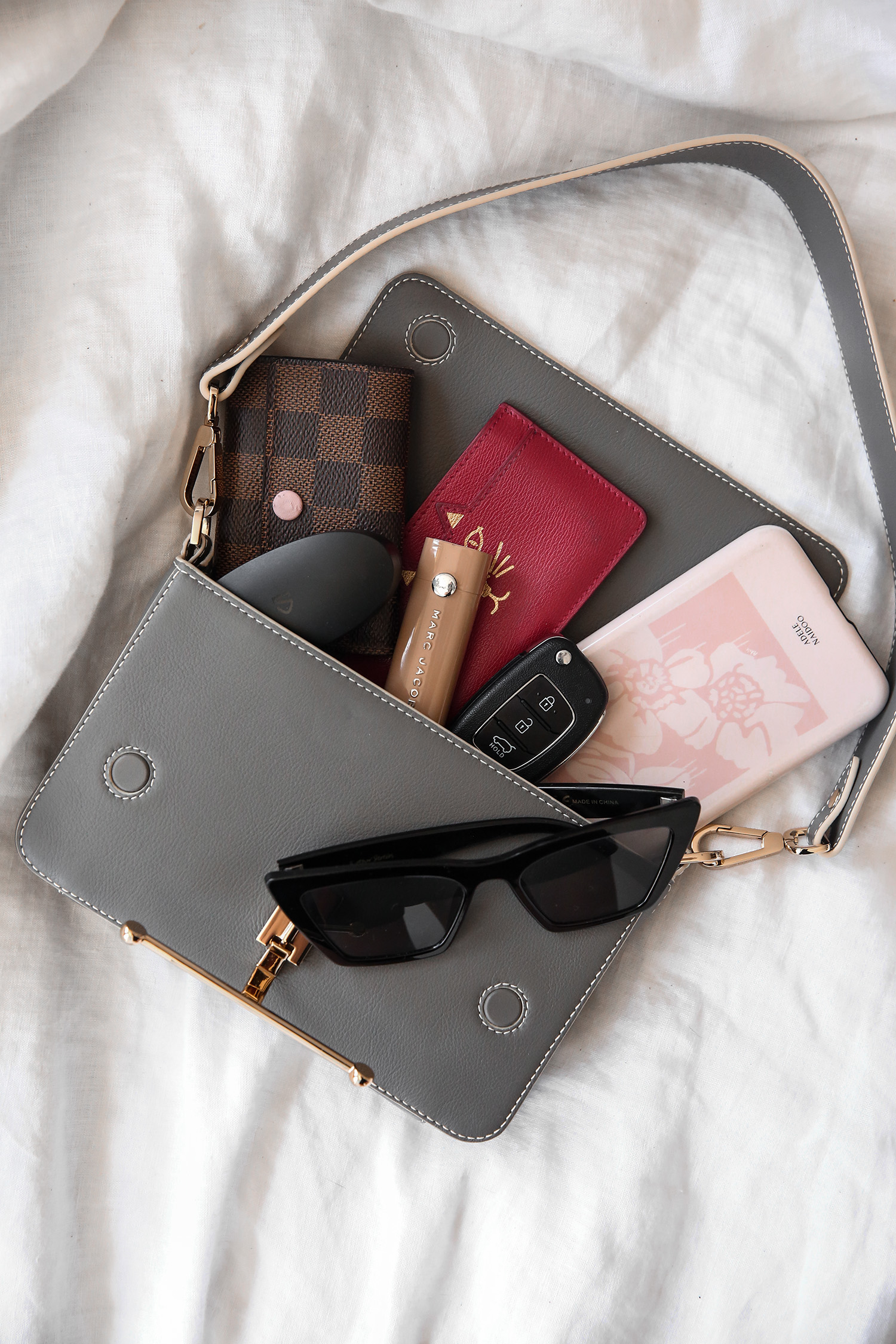 What fits inside the Strathberry Melville Baguette