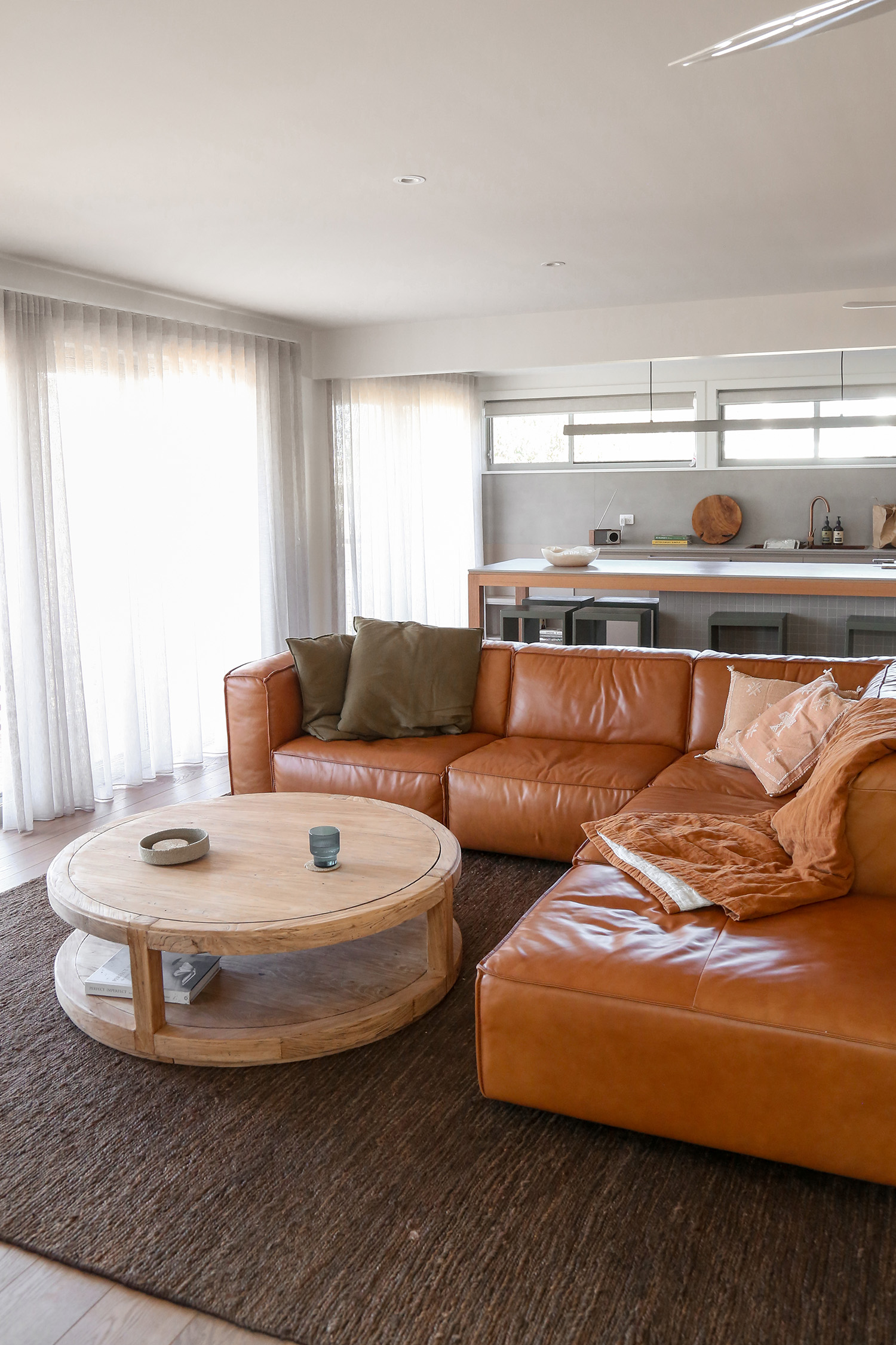 Tan leather lounge open space coastal decor