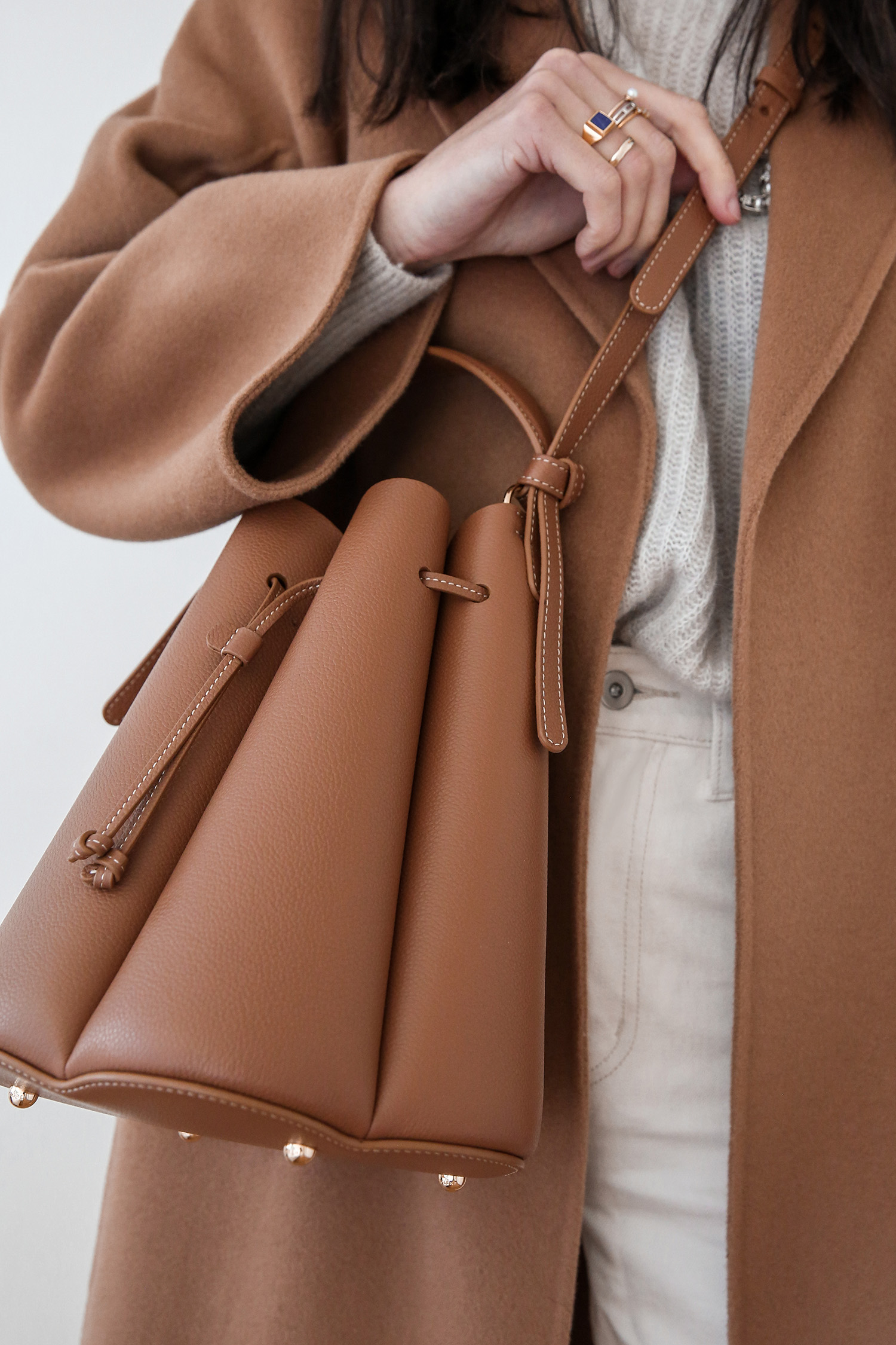 The Curated Classic coat in camel with Polene numero huit bag