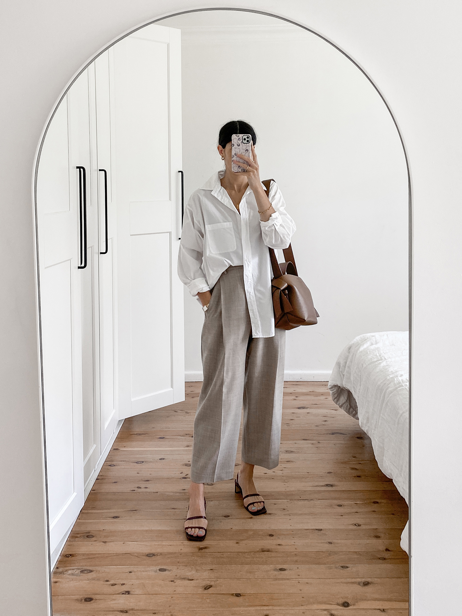 Minimal Chic outfit wearing Moia shirt and Facade Pattern trousers