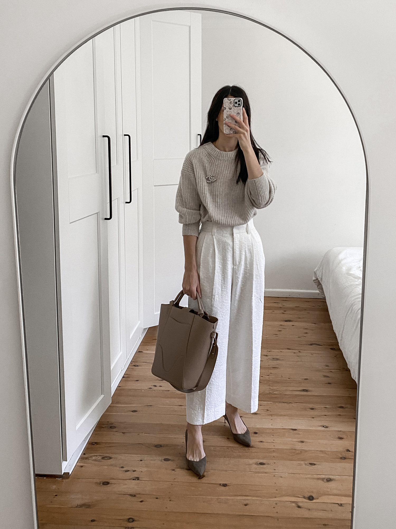 Everlane alpaca knit with Chanel Brooch and House of Dagmar Valentina trousers
