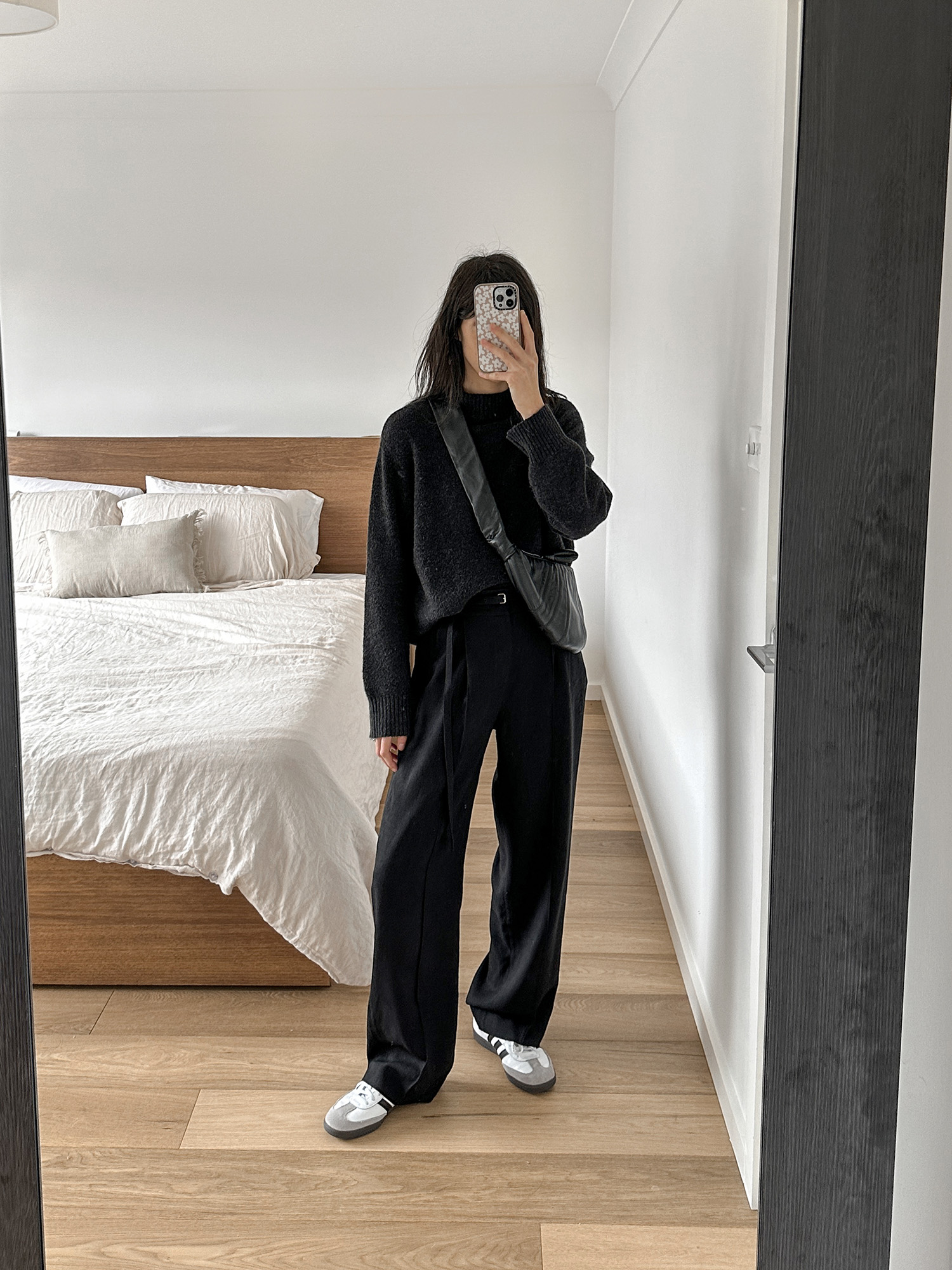 All black outfit wearing Lemaire croissant bag
