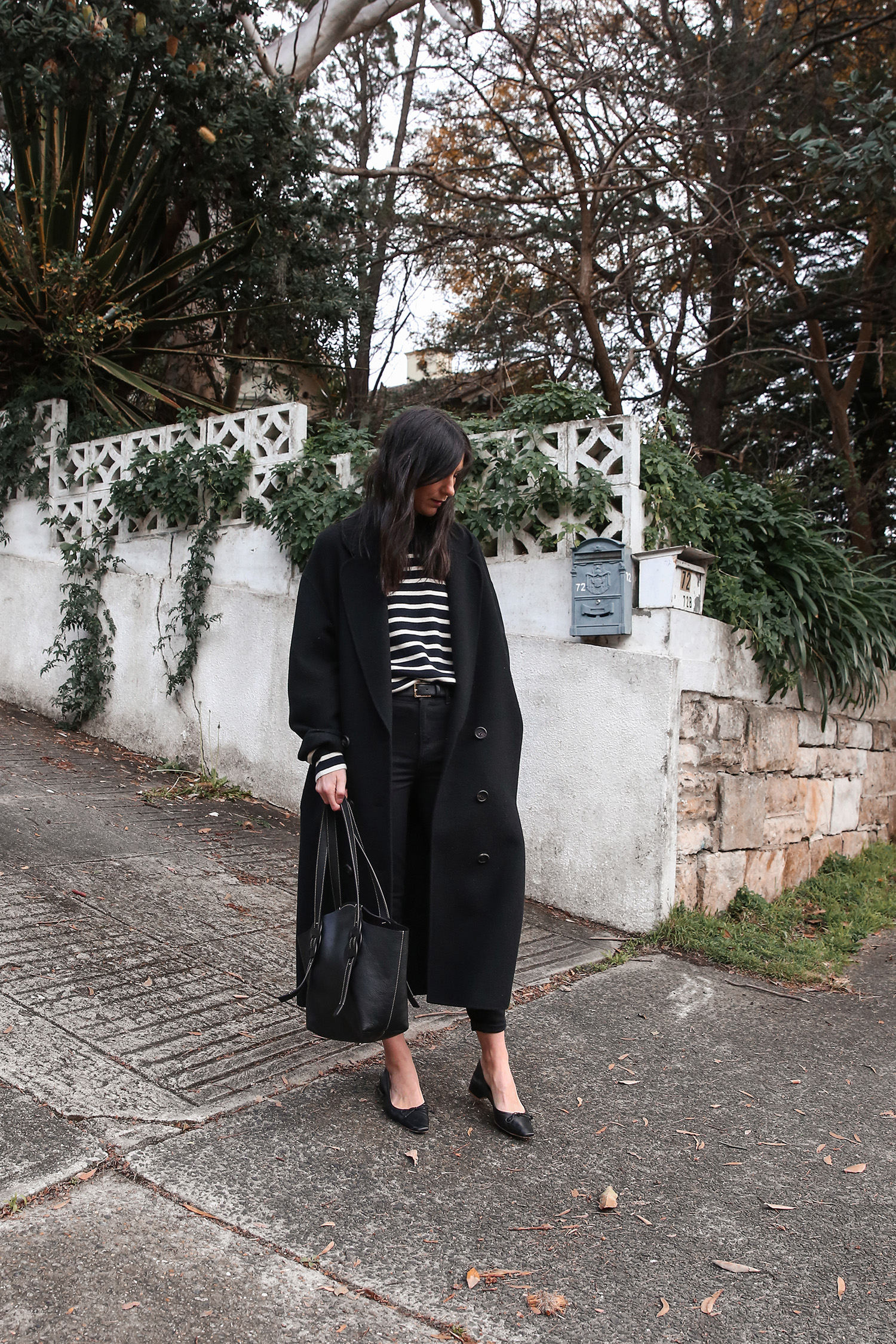 Mansur Gavriel wool coat and Reformation high and skinny jeans