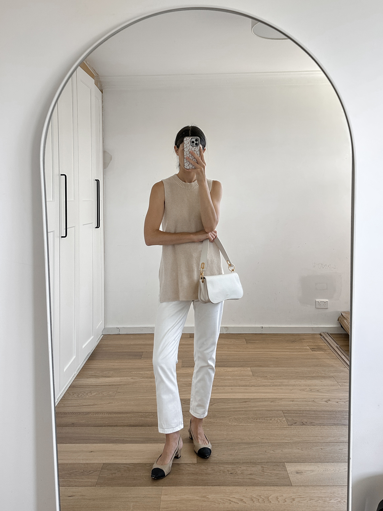 Laing Home sleeveless cashmere knit with Everlane 90s cheeky jeans