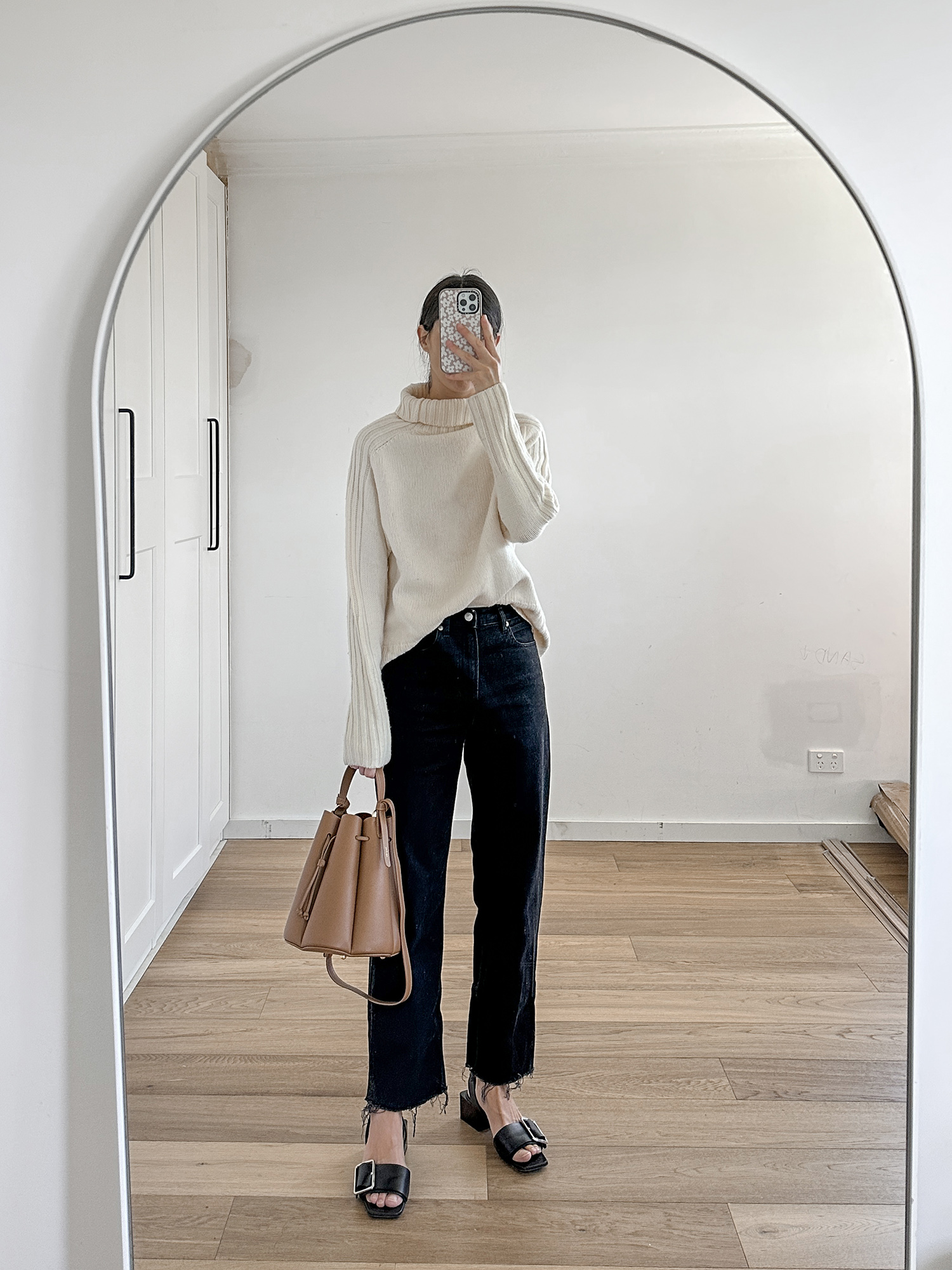 Joseph roll neck knit with Everlane Way High jeans and Jil Sander sandals
