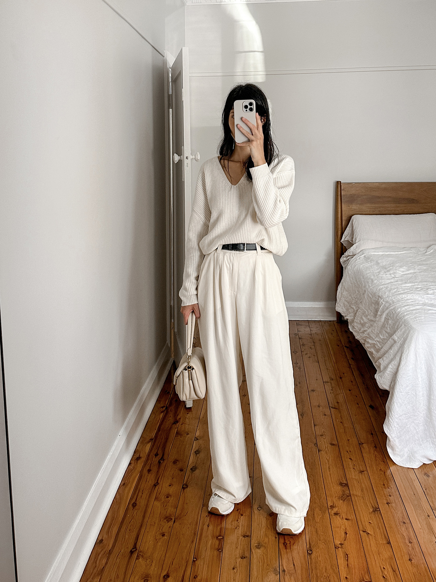 Wearing Jenni Kayne cabin sweater with DISSH linen trousers and New Balance sneakers