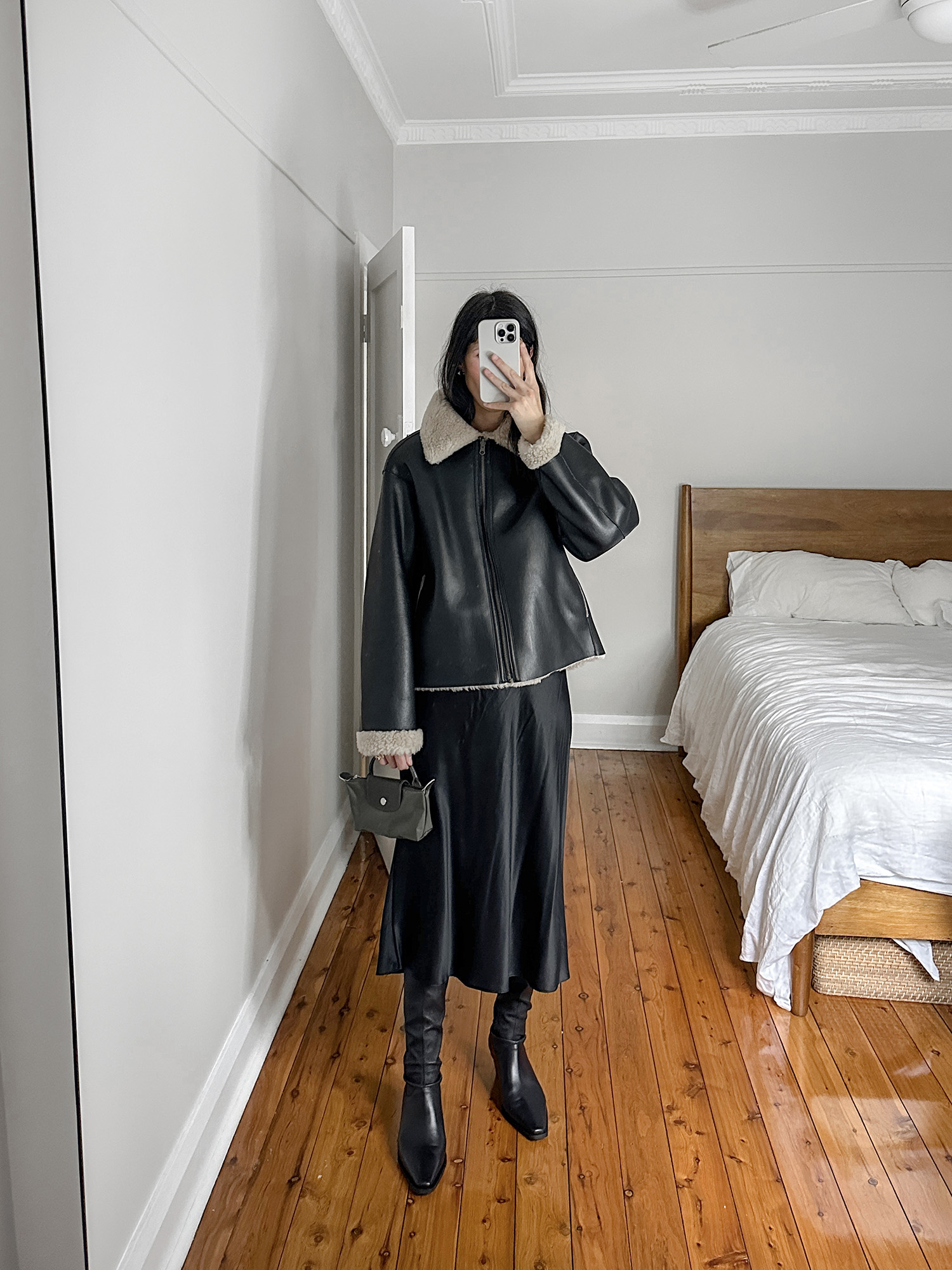 Facade Pattern shearling jacket with Quince silk slip skirt and Arket knee high boots