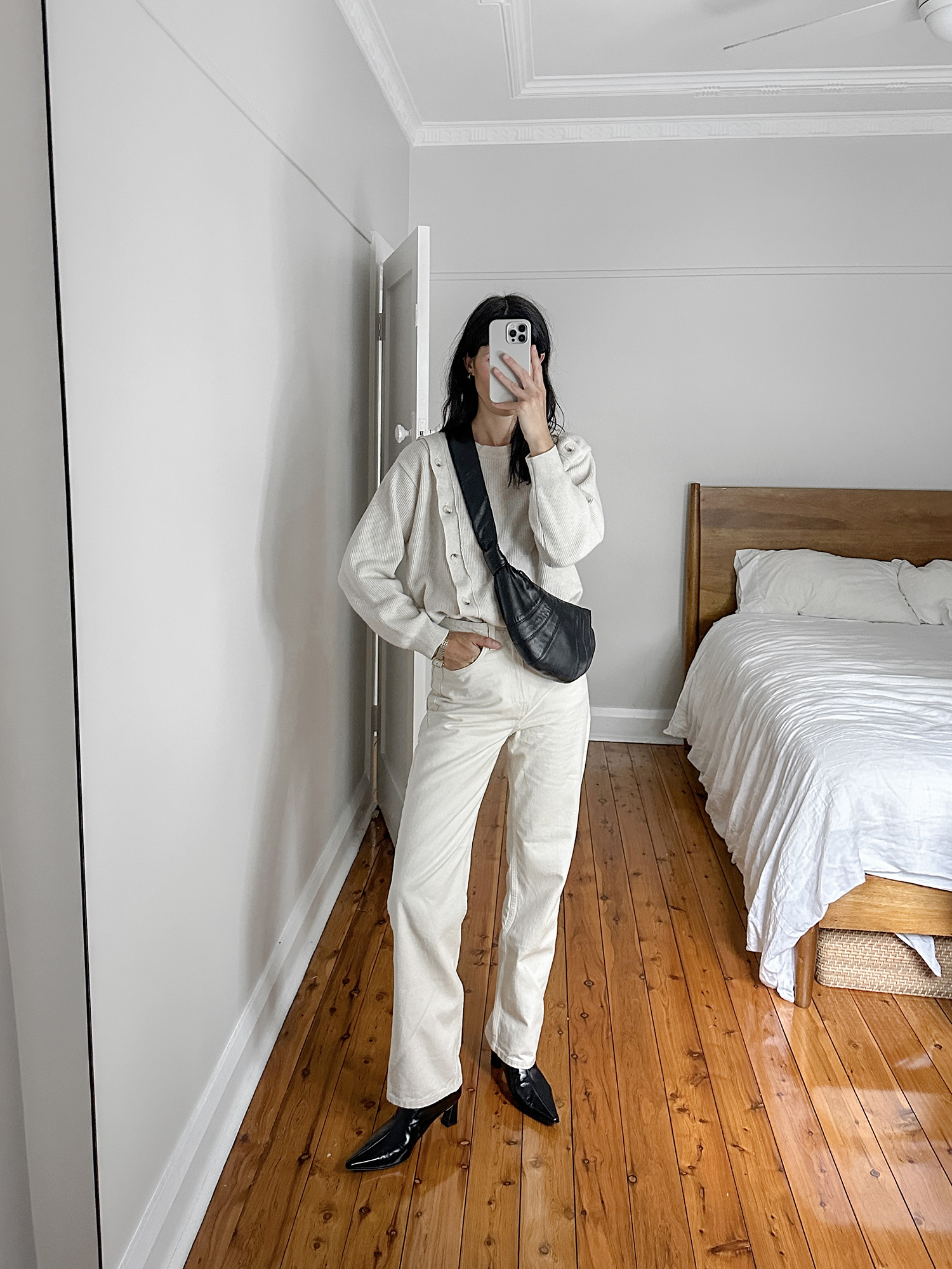 Diagonal sweater with Weekday Rowe jeans and Reike Nen boots