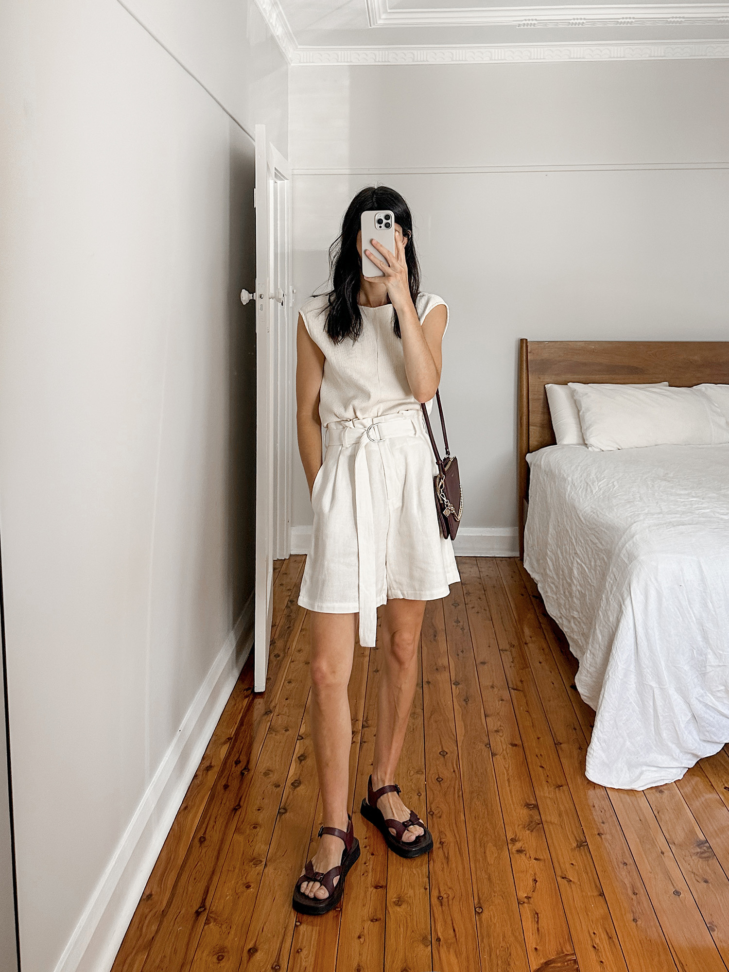 St Agni tank with Re Rhee shorts and The Row geri sandals