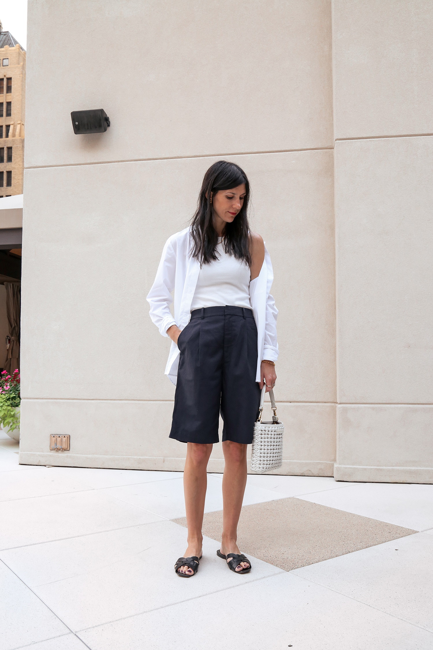 European minimalist style singlet shirt and Bermuda shorts