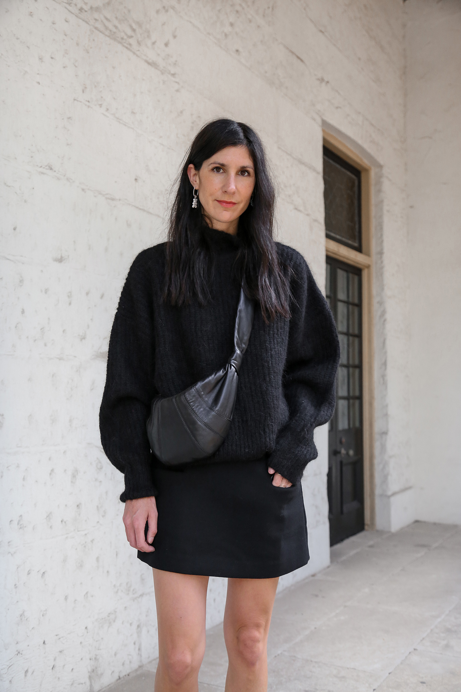 Minimal black outfit with Lemaire croissant bag in small