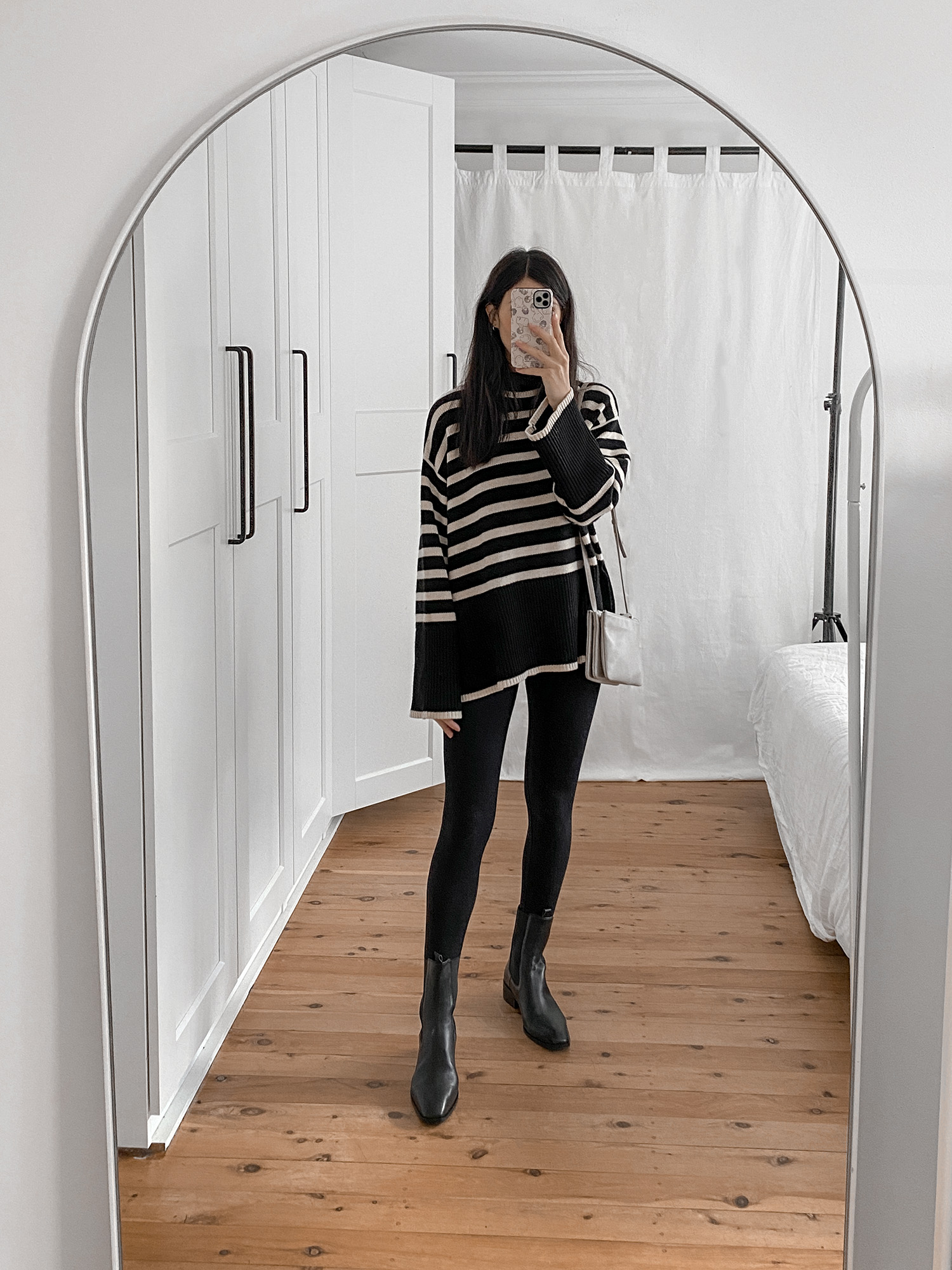 Five ways to style a Toteme striped Roll neck sweater