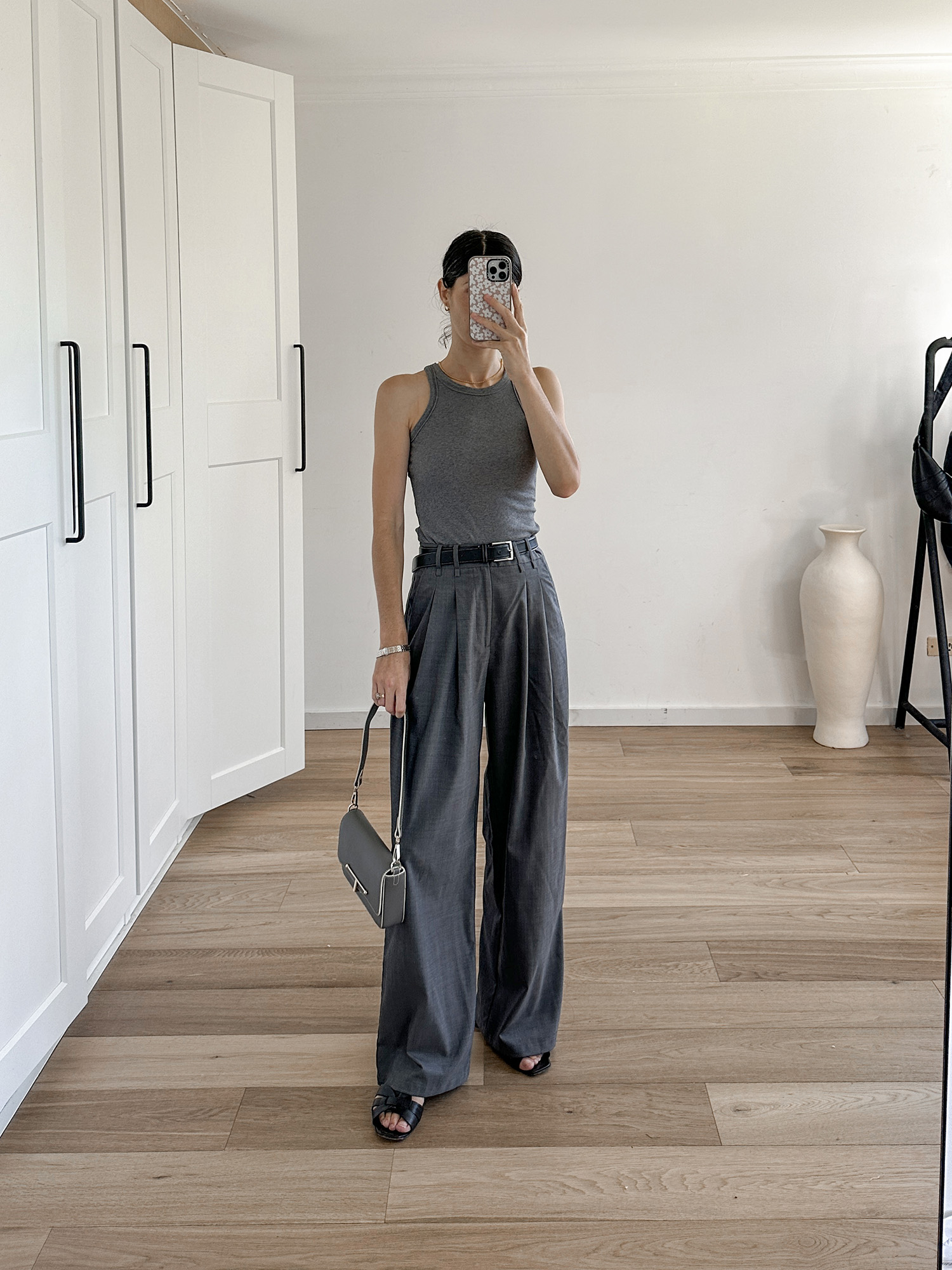 All grey monochromatic chic outfit with Toteme tank and Gentle Herd trousers