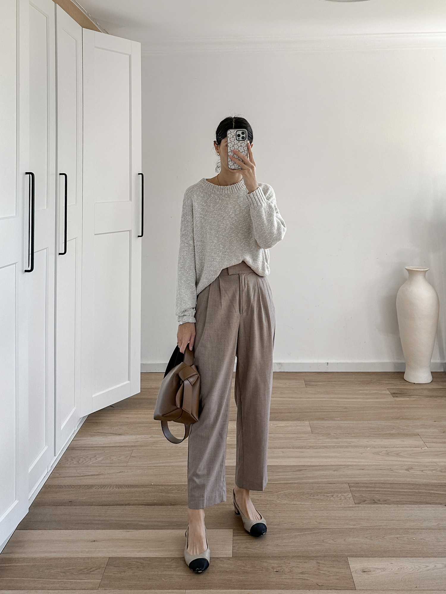 Wearing tonal outfit with Jenni Kayne sweater and Acne Studios musubi bag