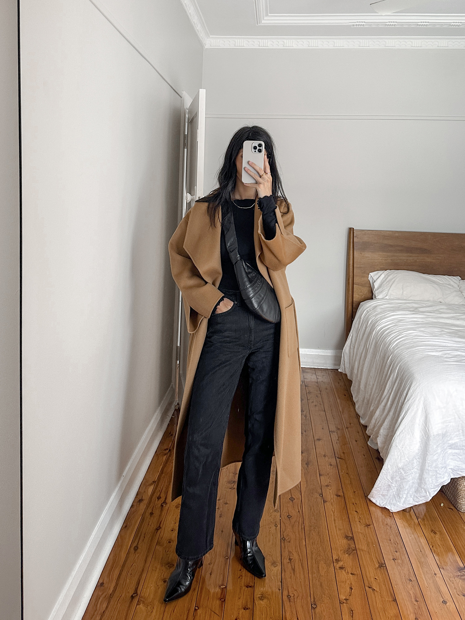 Minimalist winter style with Weekday Rowe jeans and Musee coat