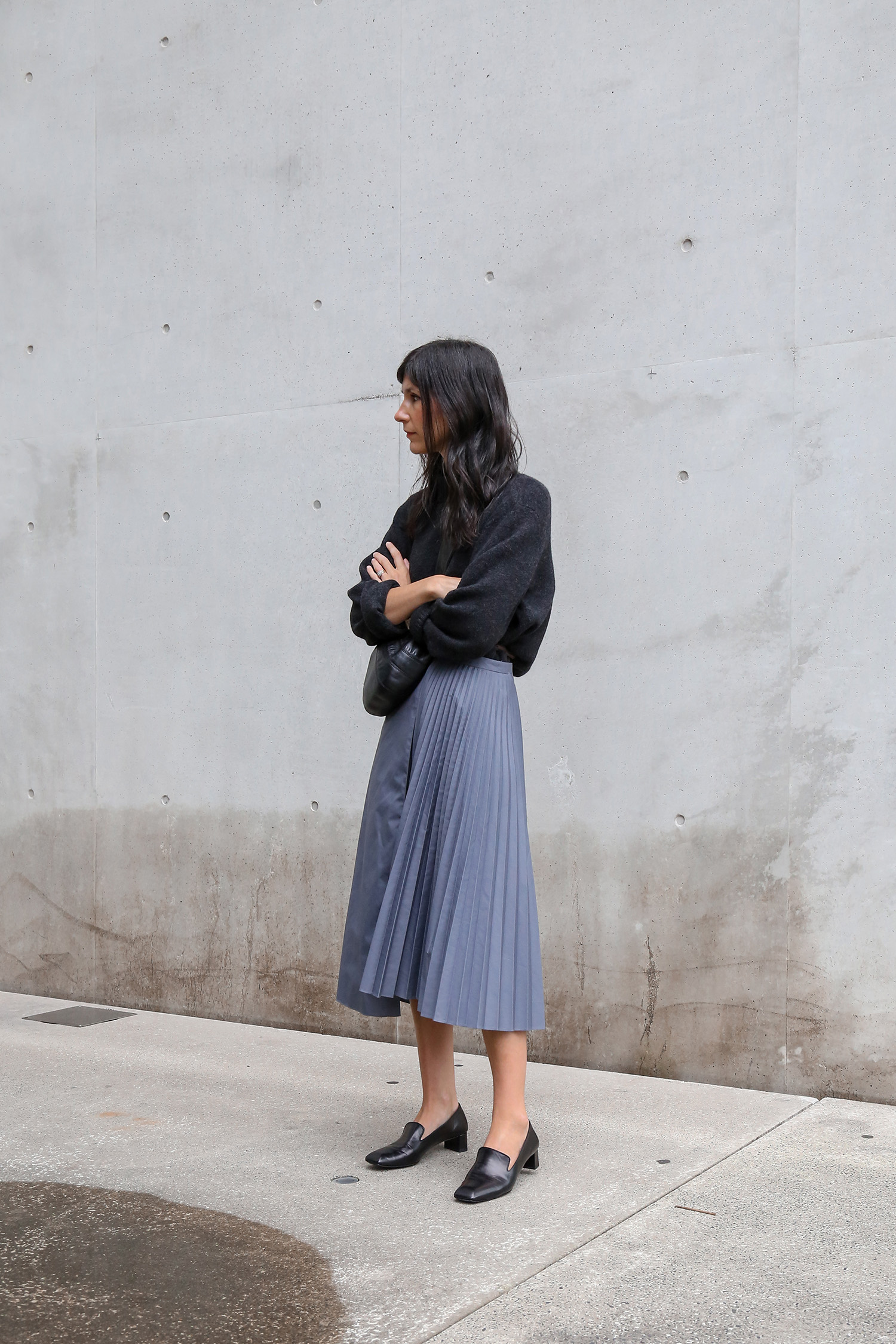 Outfit wearing Jenni Kayne Oversized Sweater with Tibi Pleated Skirt