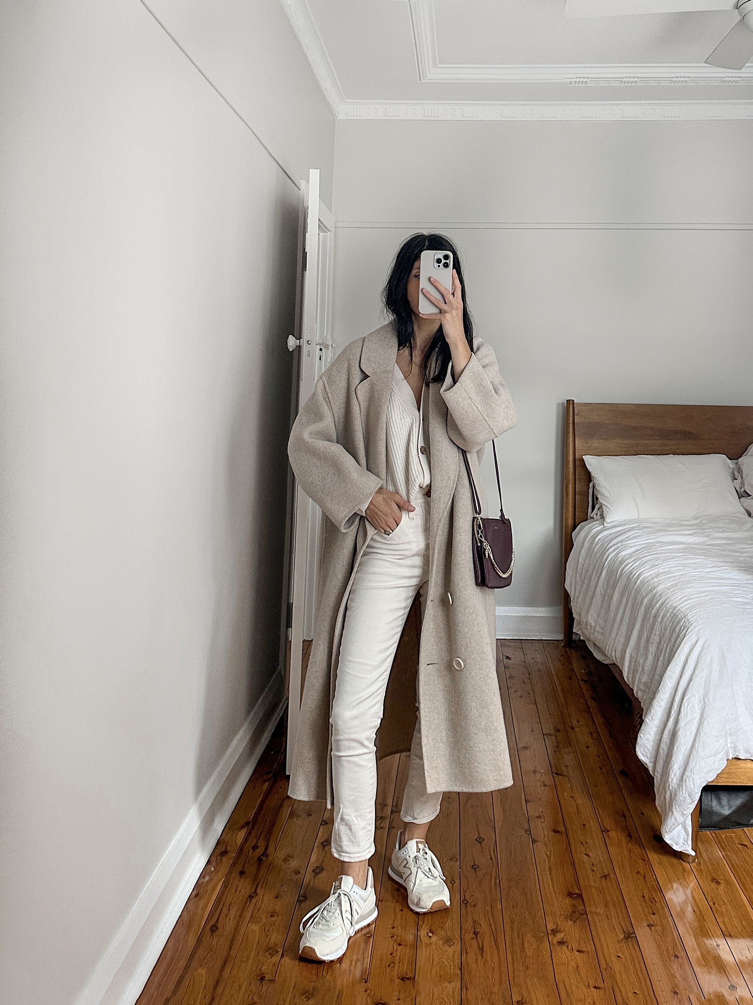wearing cream tonal outfit with Quince cardigan and Madewell skinny jeans