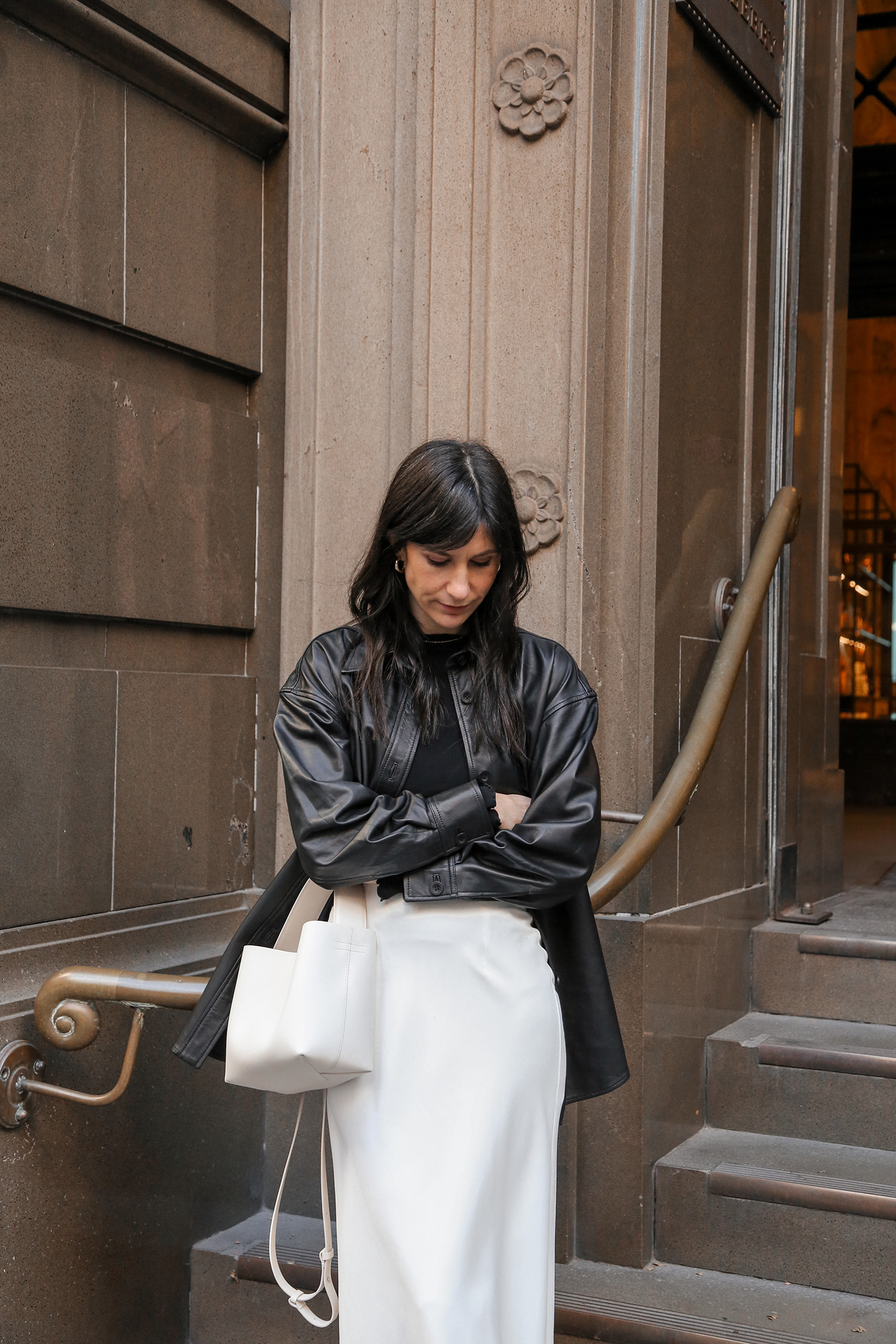 Quince leather shirt with Arket crossbody bag Acne Musubi dupe