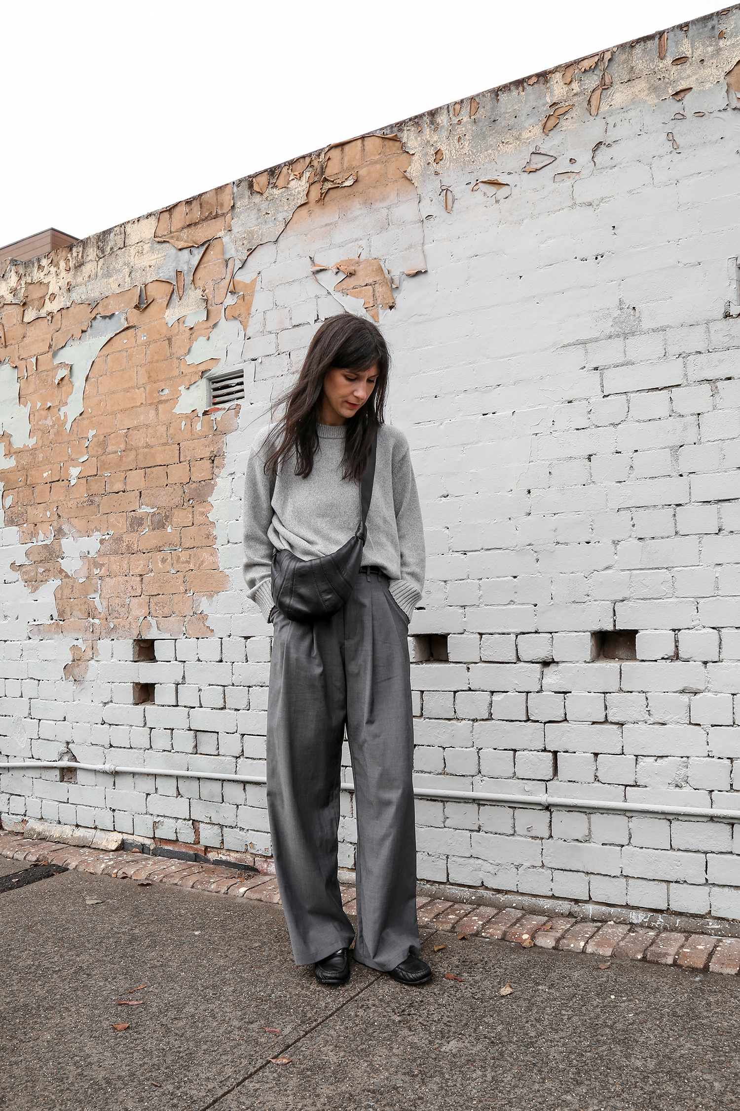 All grey outfit with black crossbody bag