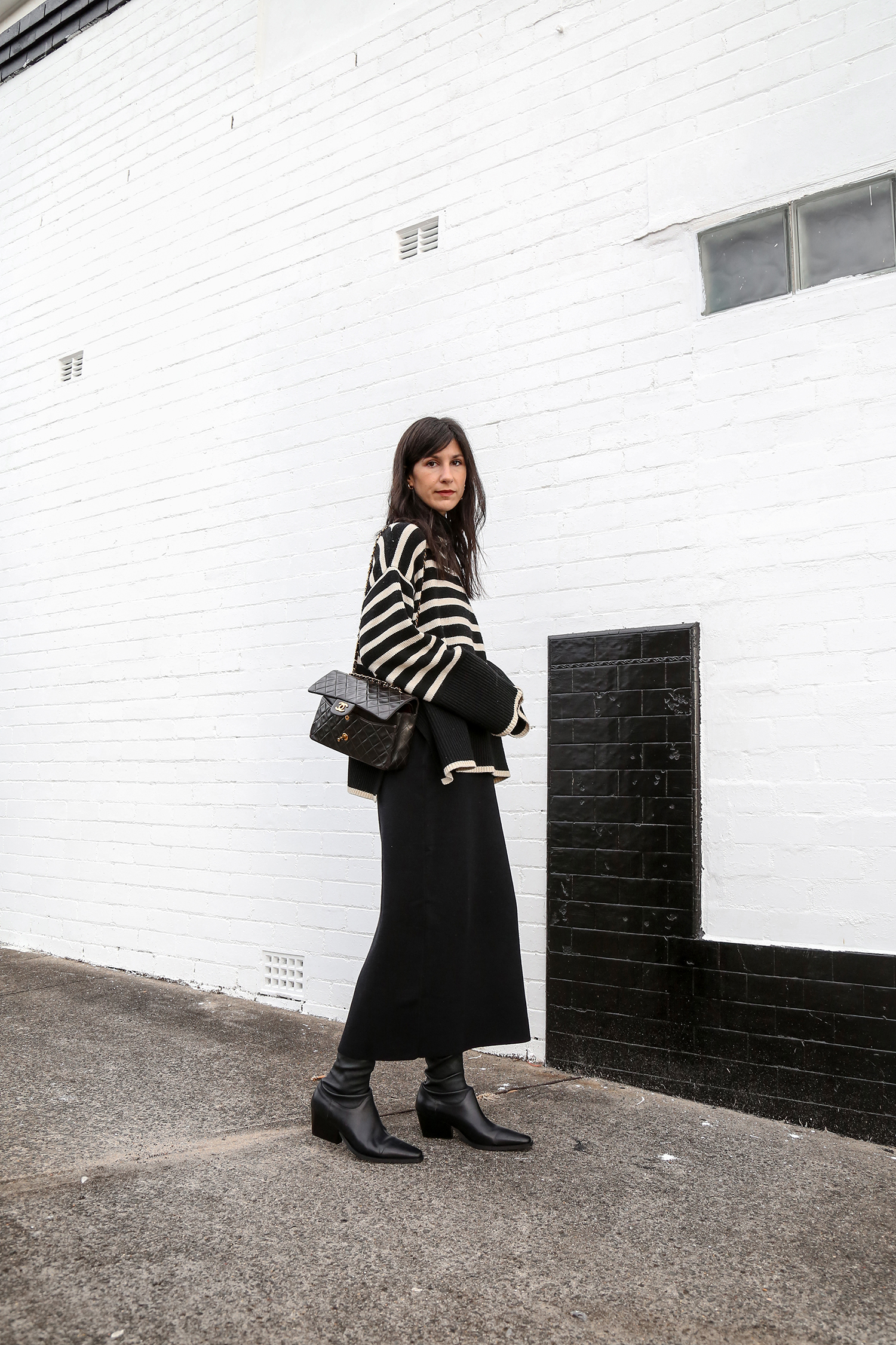 Wearing Toteme striped knit with Deiji Studios skirt and Arket boots